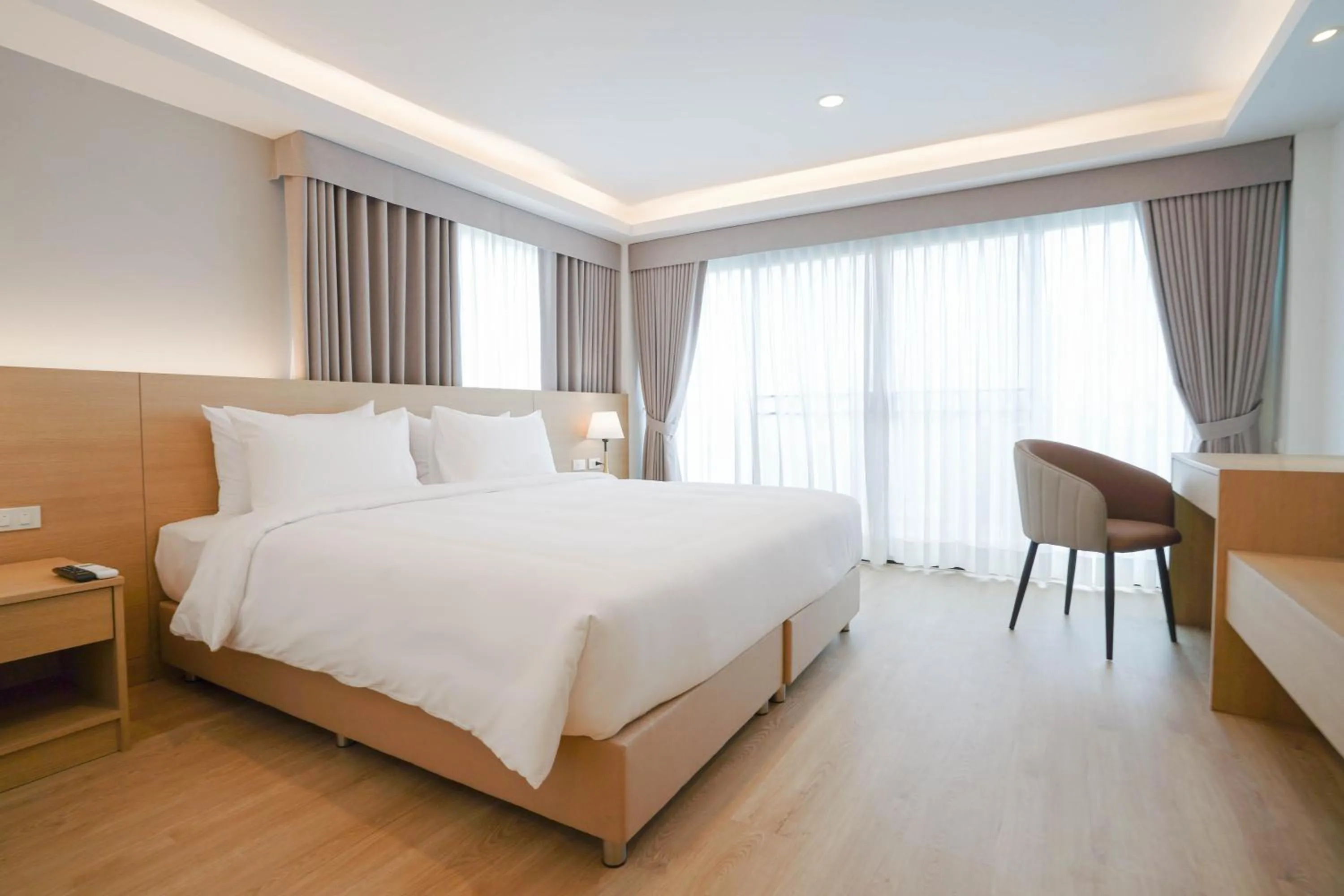 Bed in The Kite Hotel Bangsaen by Koko