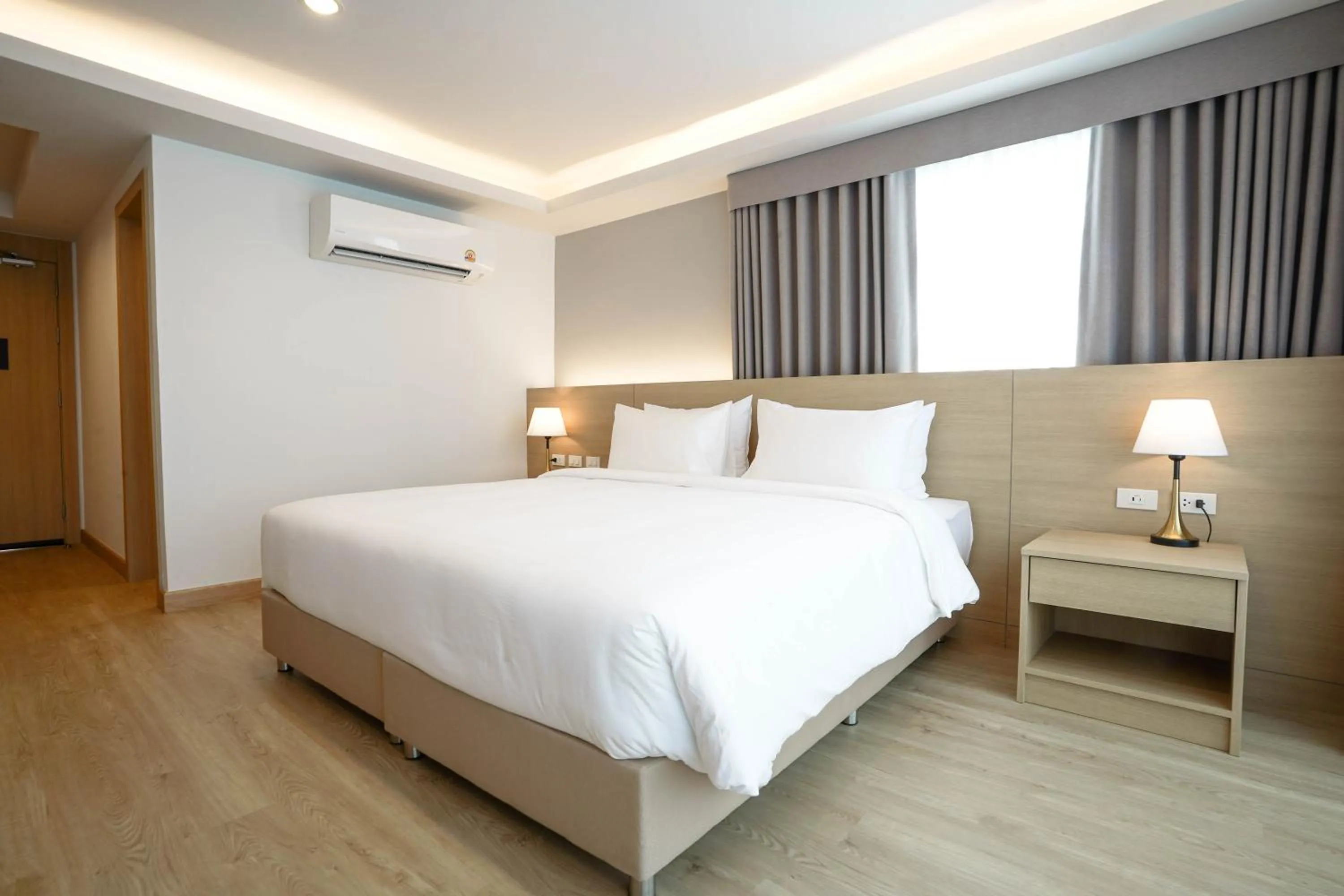 Bed in The Kite Hotel Bangsaen by Koko