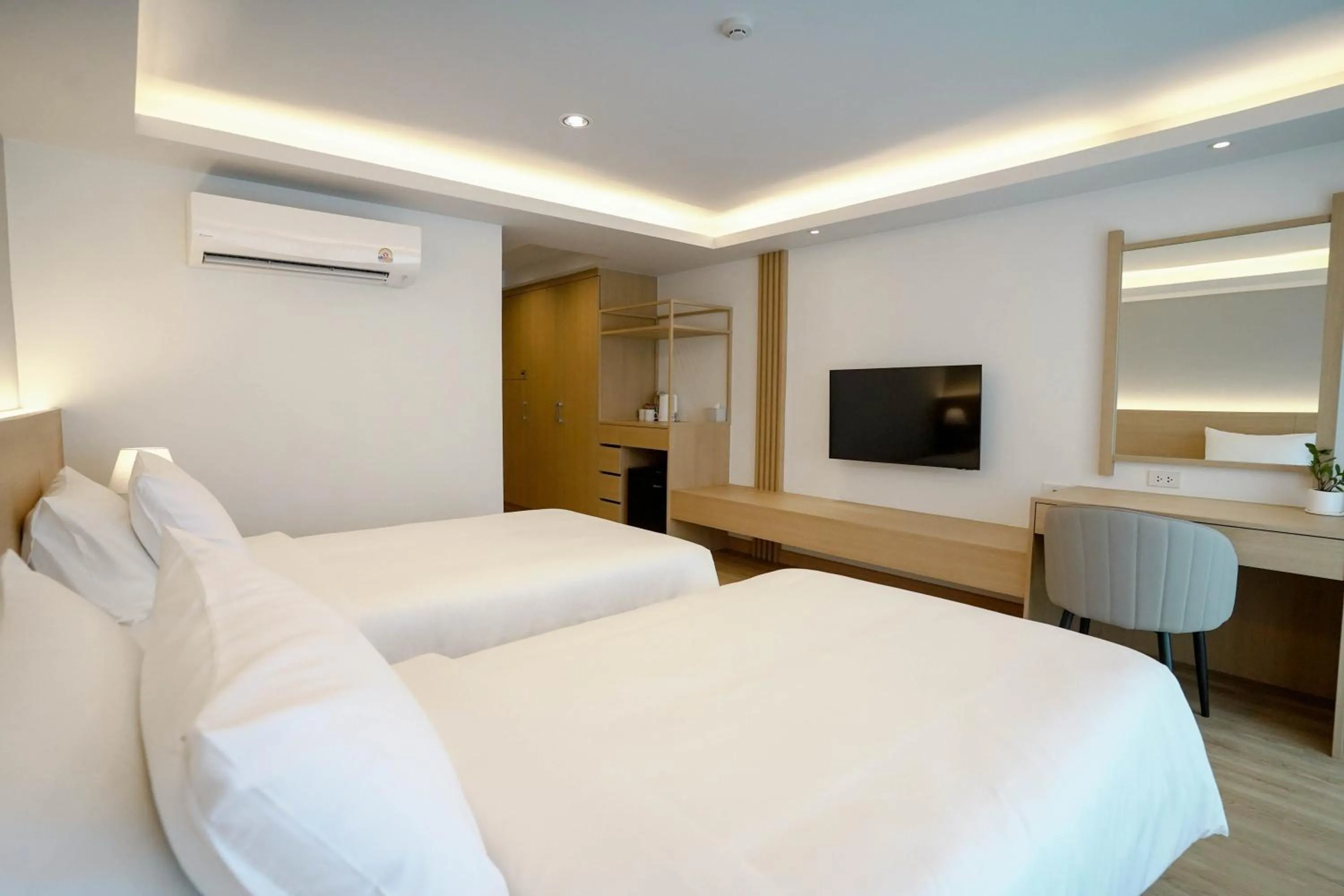 Bed in The Kite Hotel Bangsaen by Koko