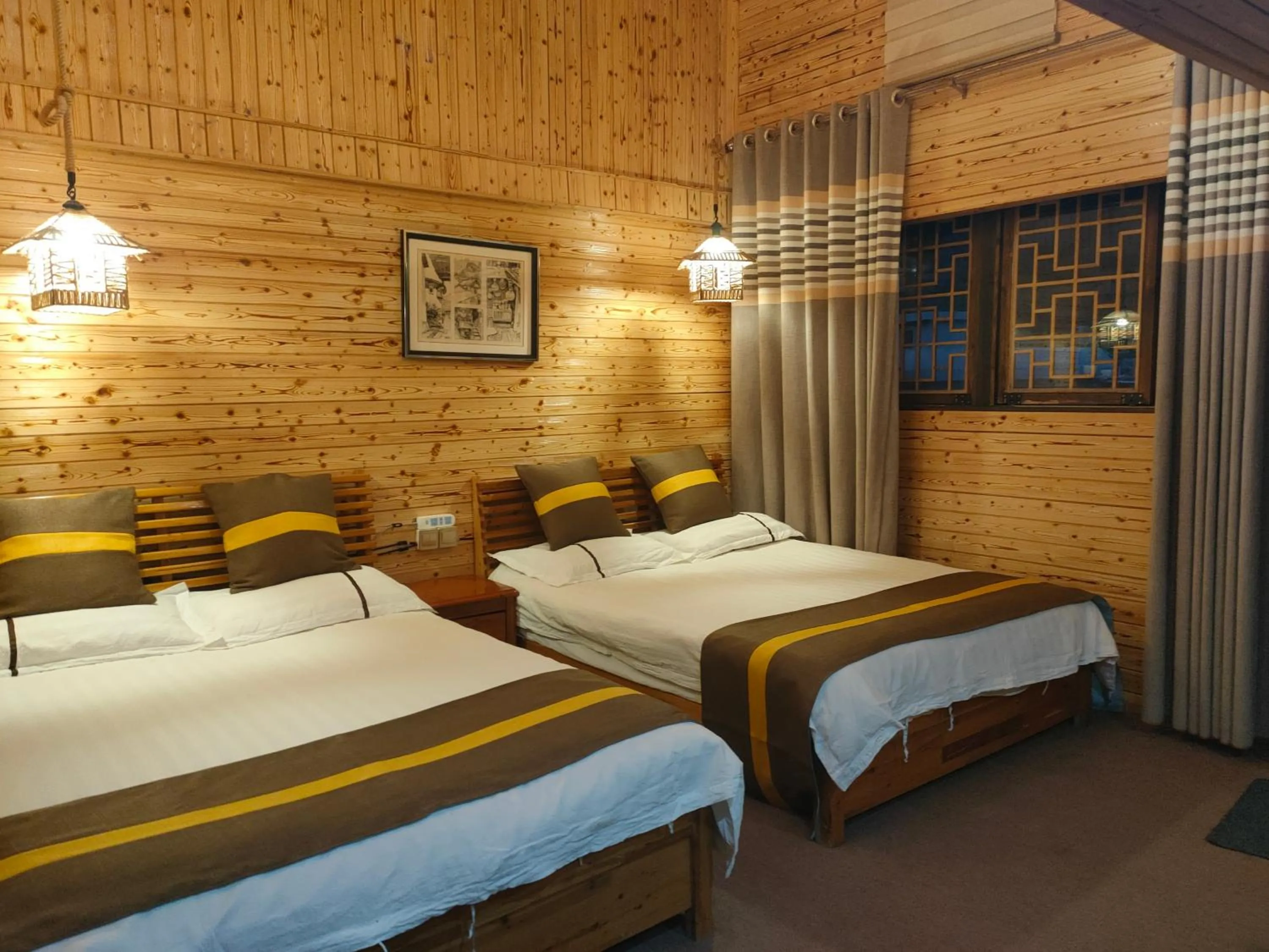 Bed in Nanjing Tulou Qingdelou Inn