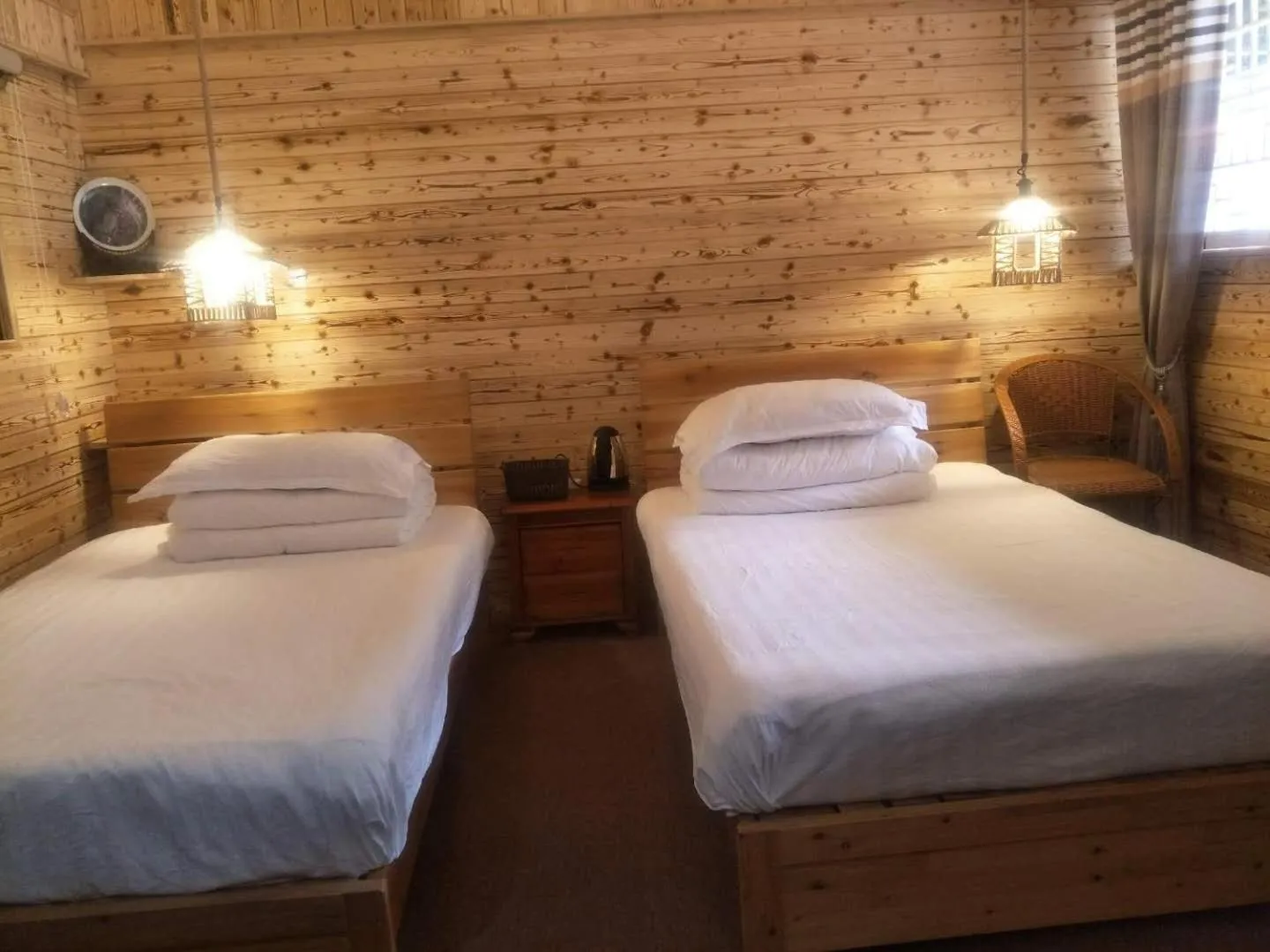 Bed in Nanjing Tulou Qingdelou Inn