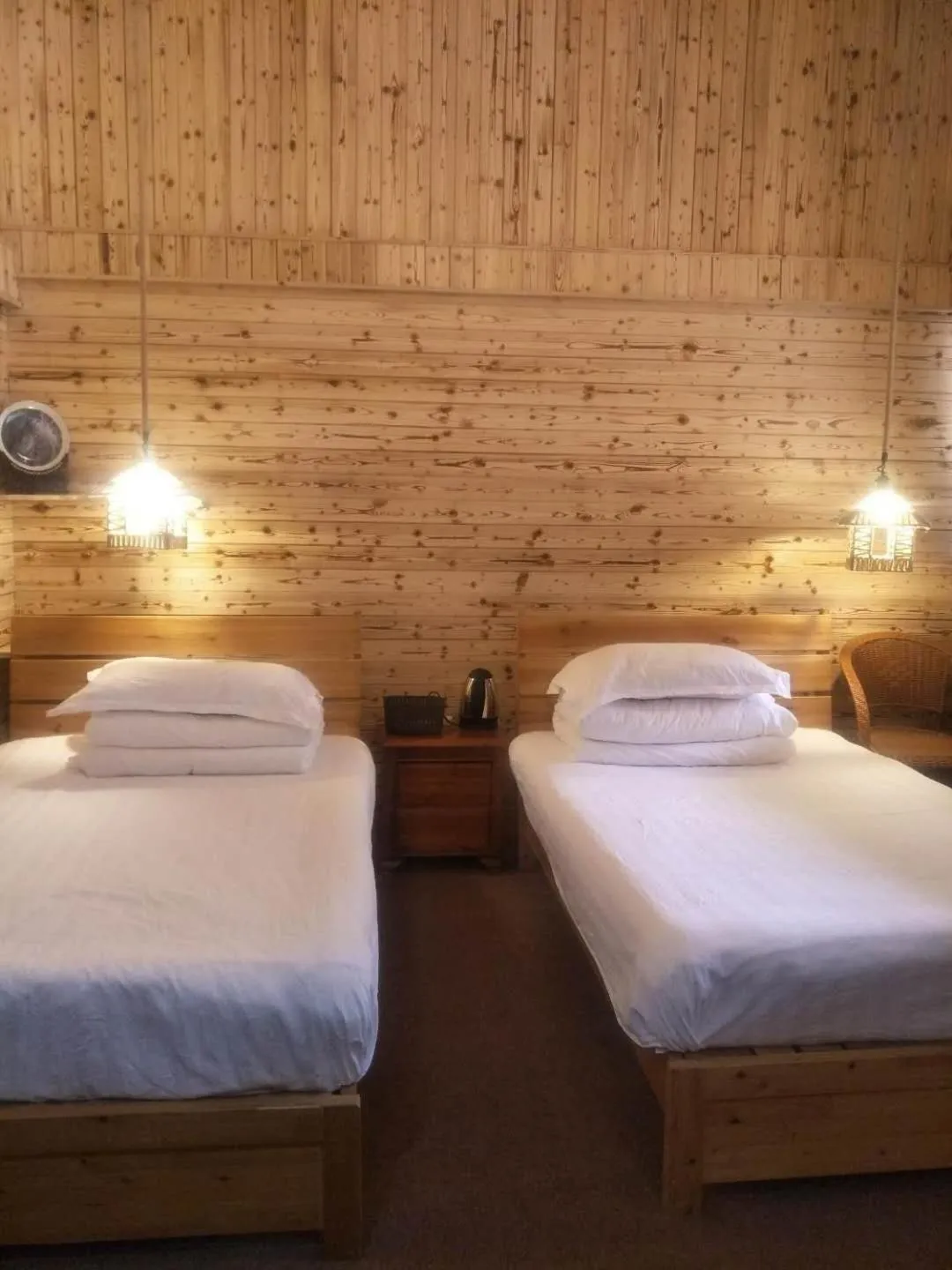 Bed in Nanjing Tulou Qingdelou Inn