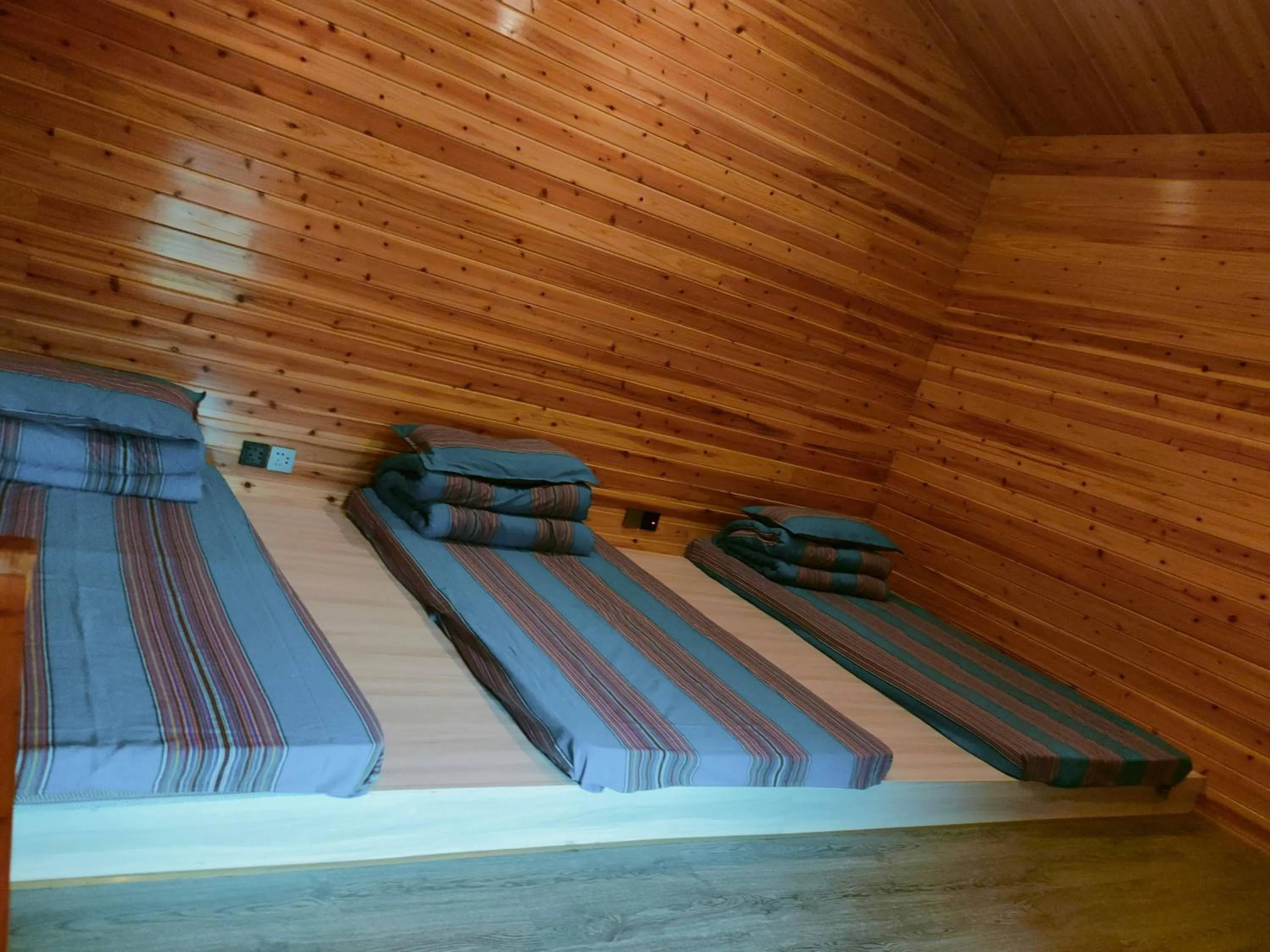 Bed in Nanjing Tulou Qingdelou Inn