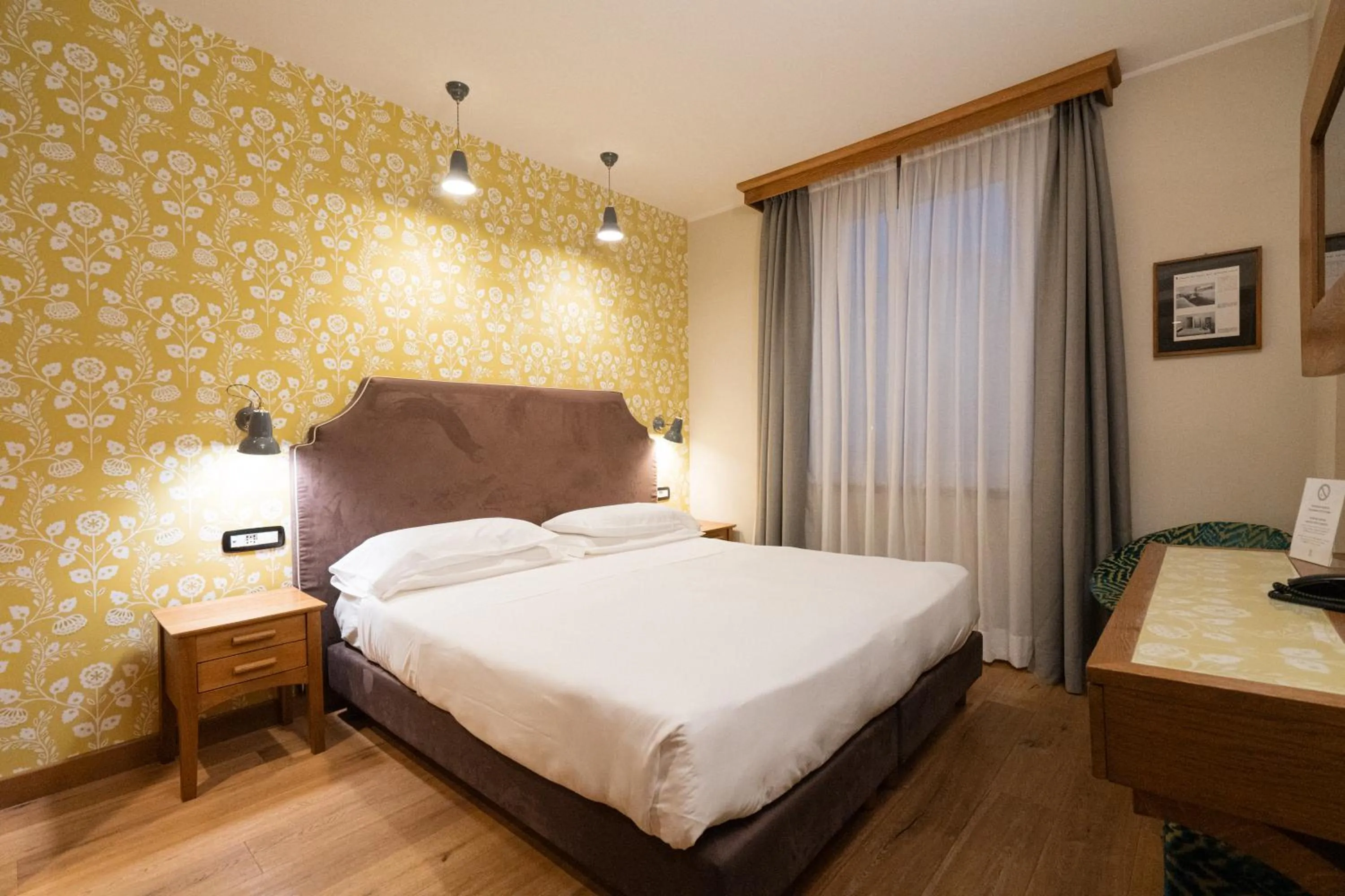 Bed in Duca D'Aosta Hotel