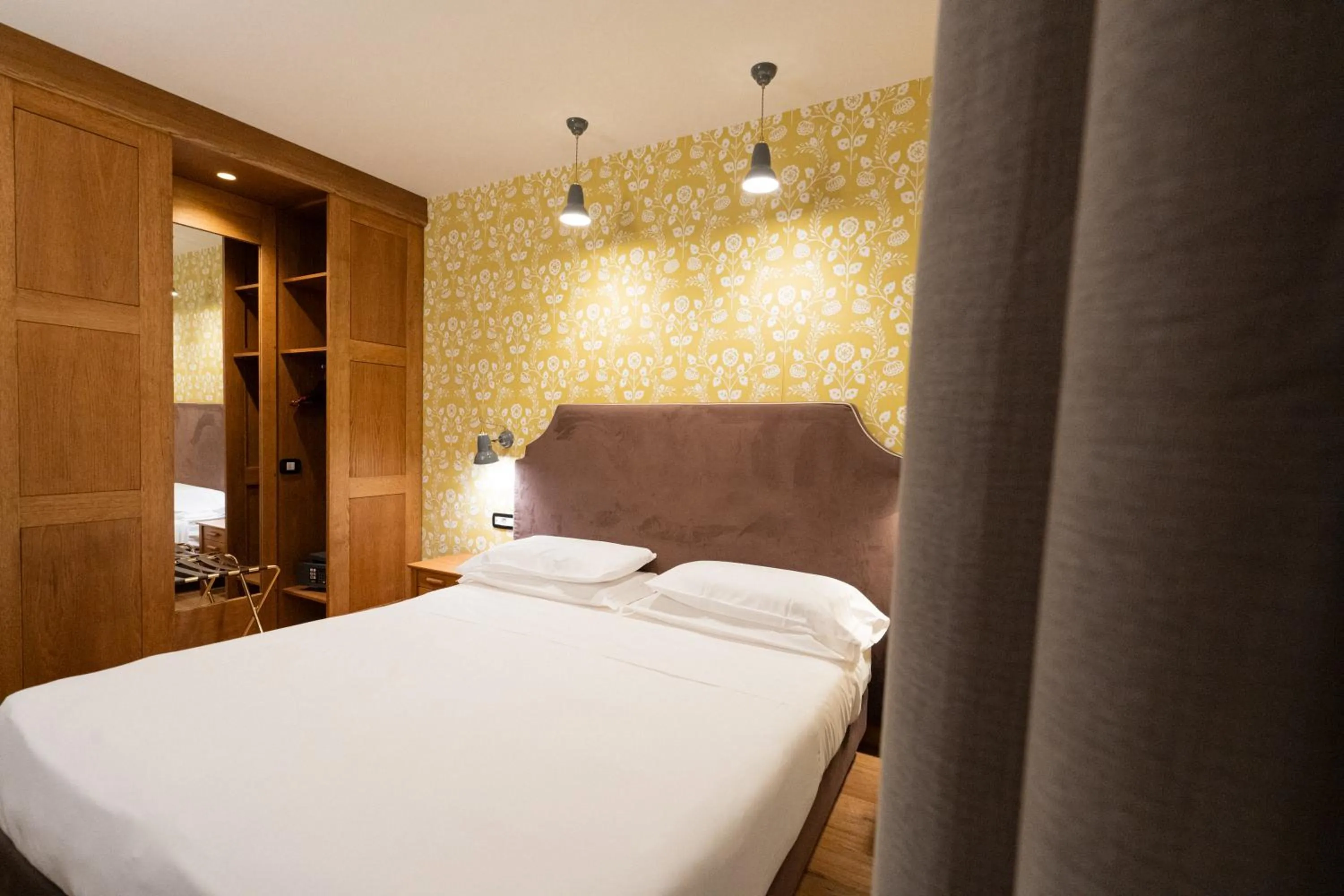 Bed in Duca D'Aosta Hotel