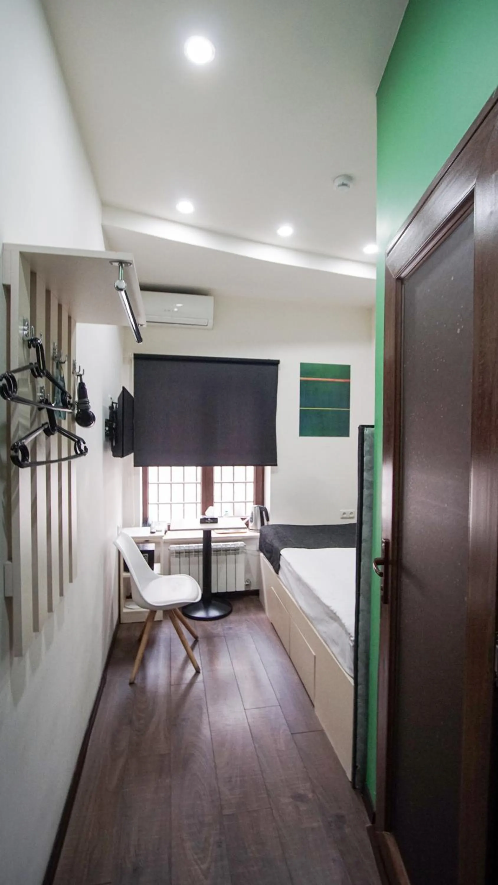 Bedroom in Elysium Gallery Hotel