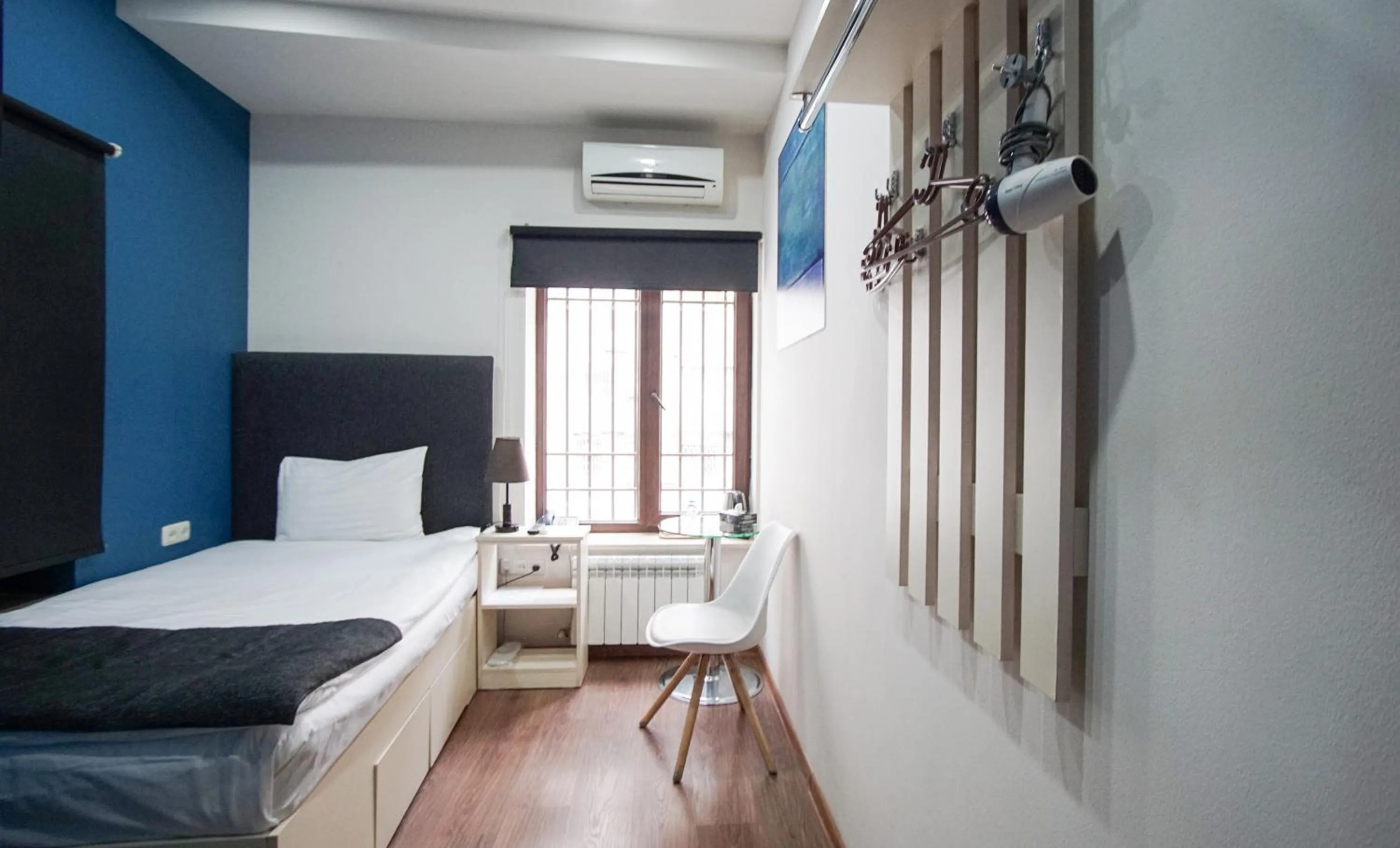 Bed in Elysium Gallery Hotel