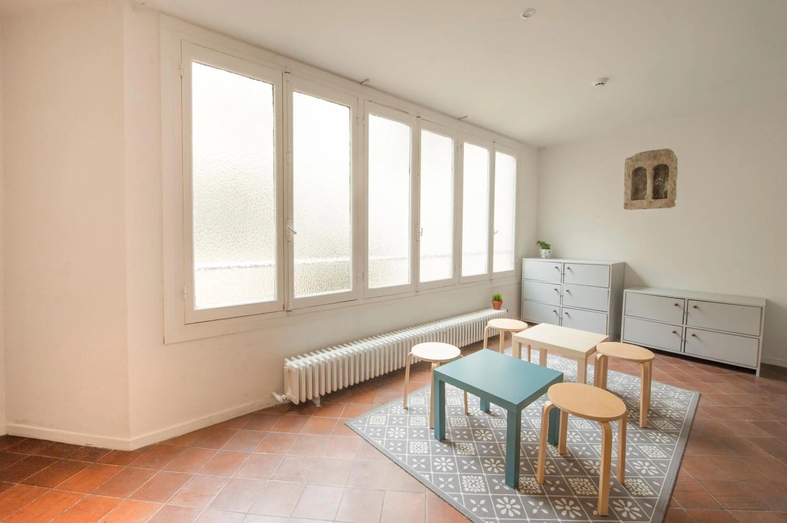 Communal lounge/ TV room in A Room In The City Hostel