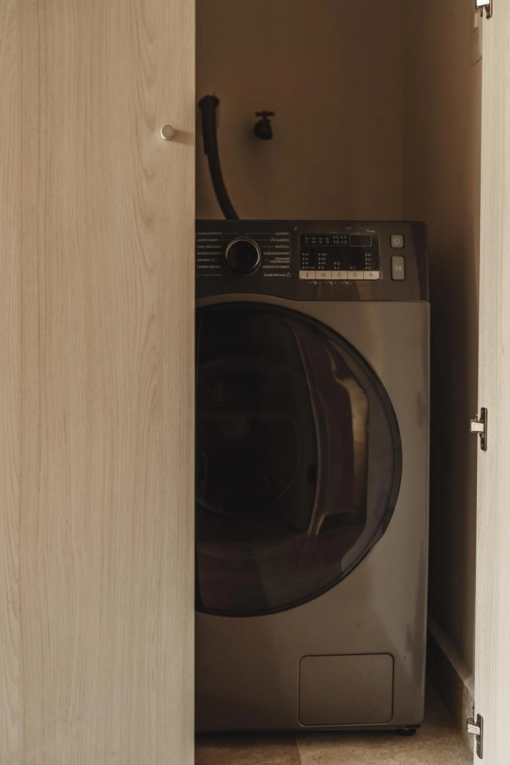 washing machine in Best Condo with Rooftop Pool, Gym, Coworking, Cinema