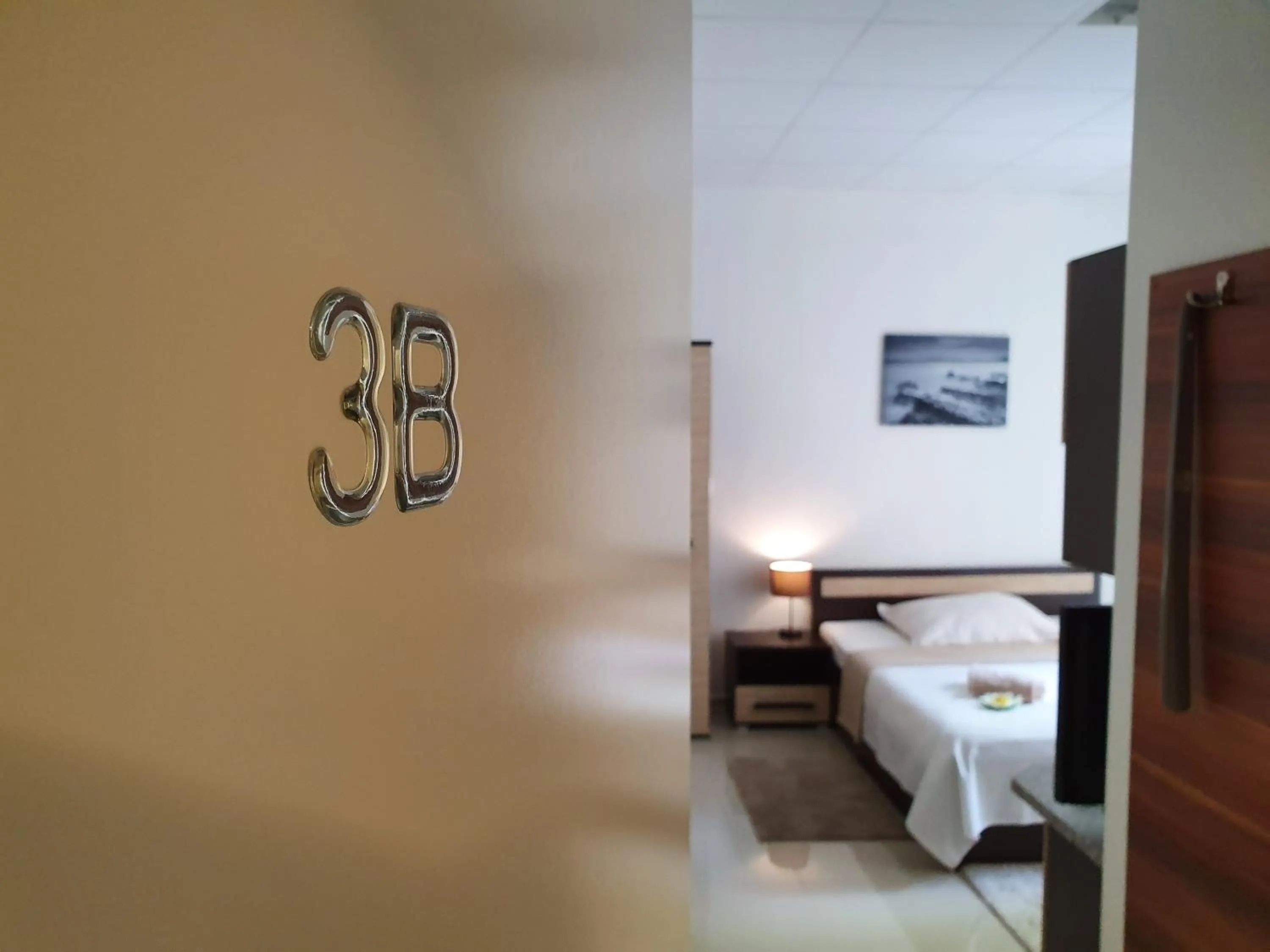 Decorative detail, Bed in Madonna Apartments