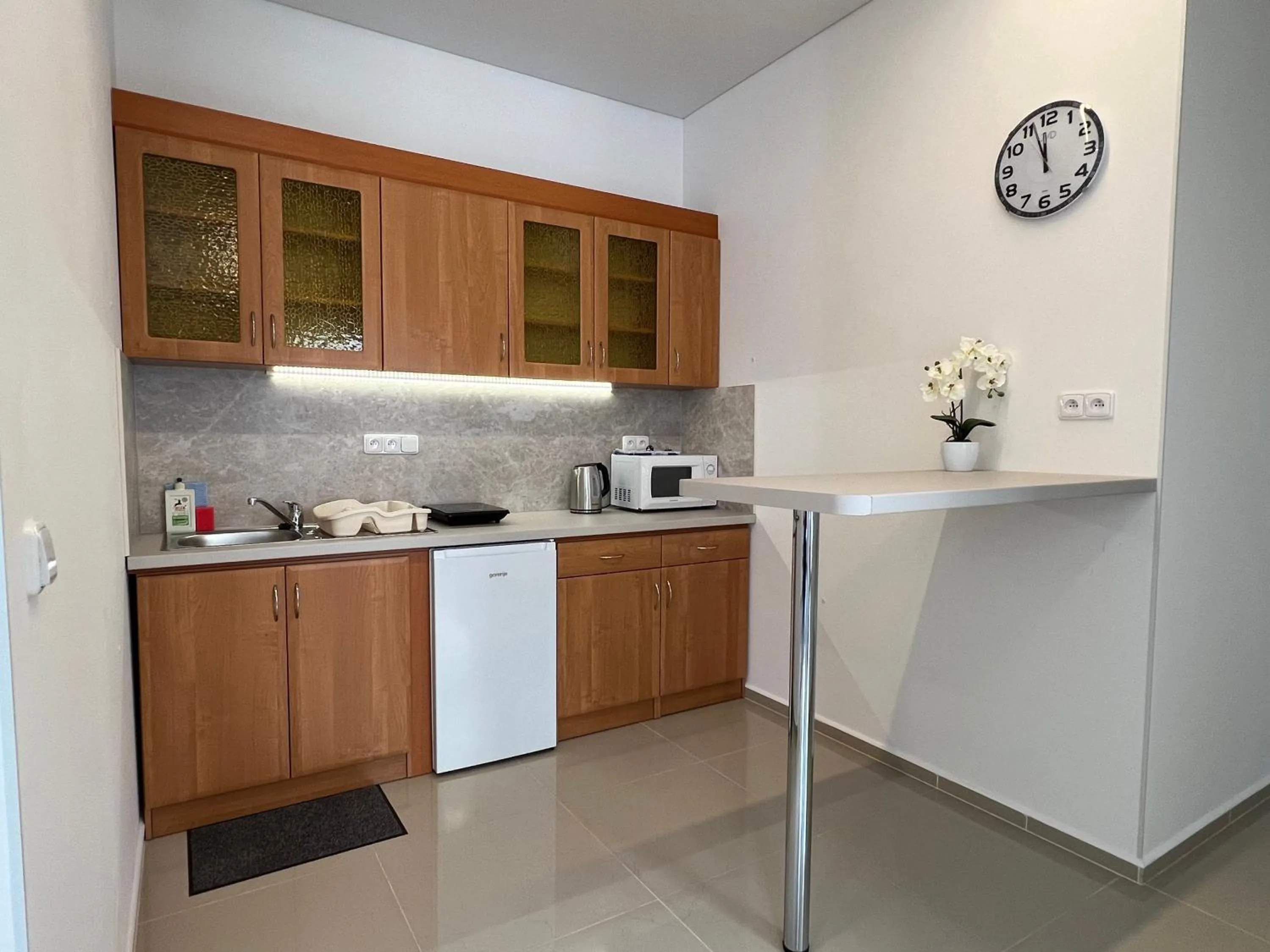 Kitchen or kitchenette in Madonna Apartments
