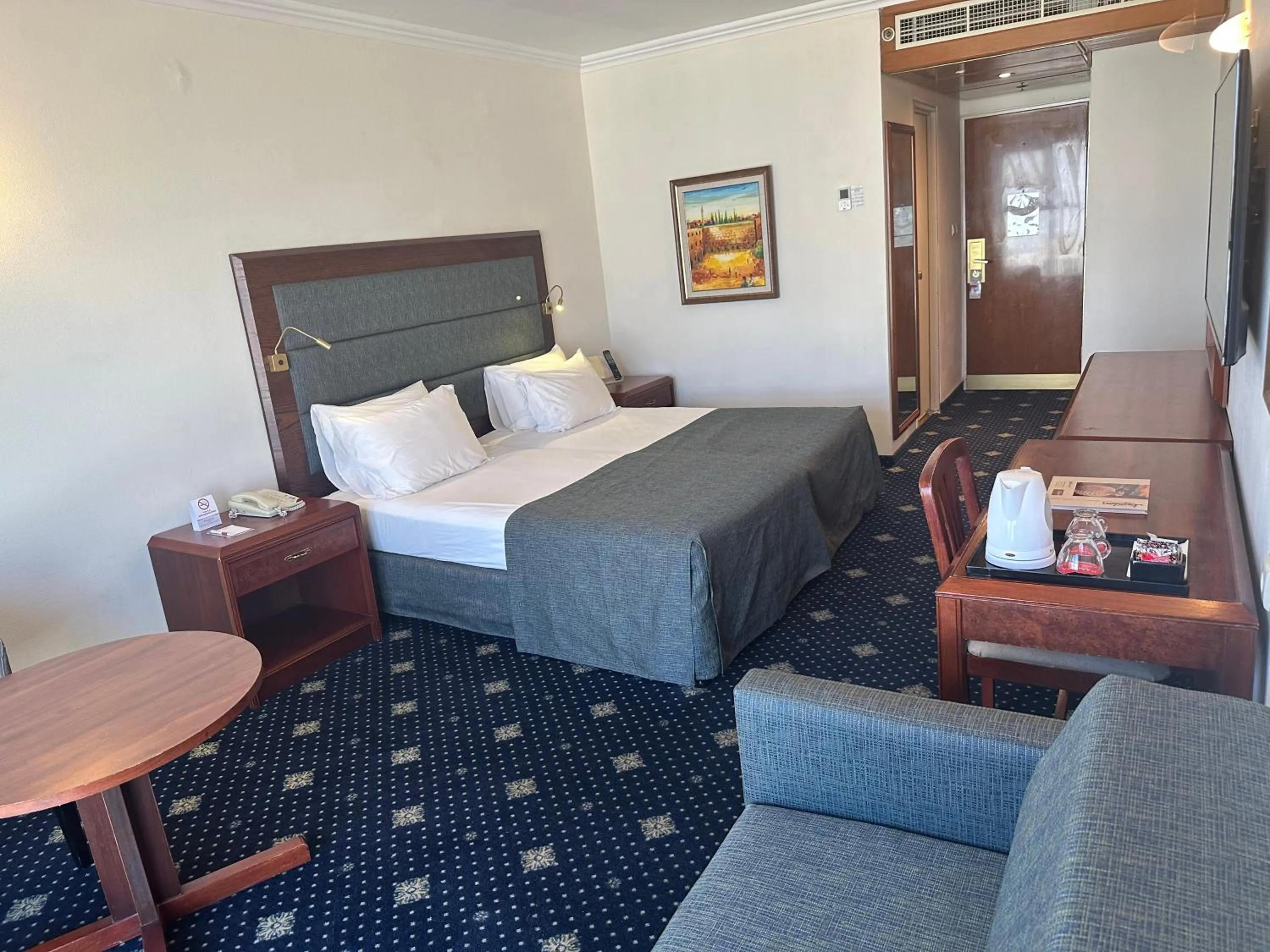 Bed in Ramada Jerusalem Hotel