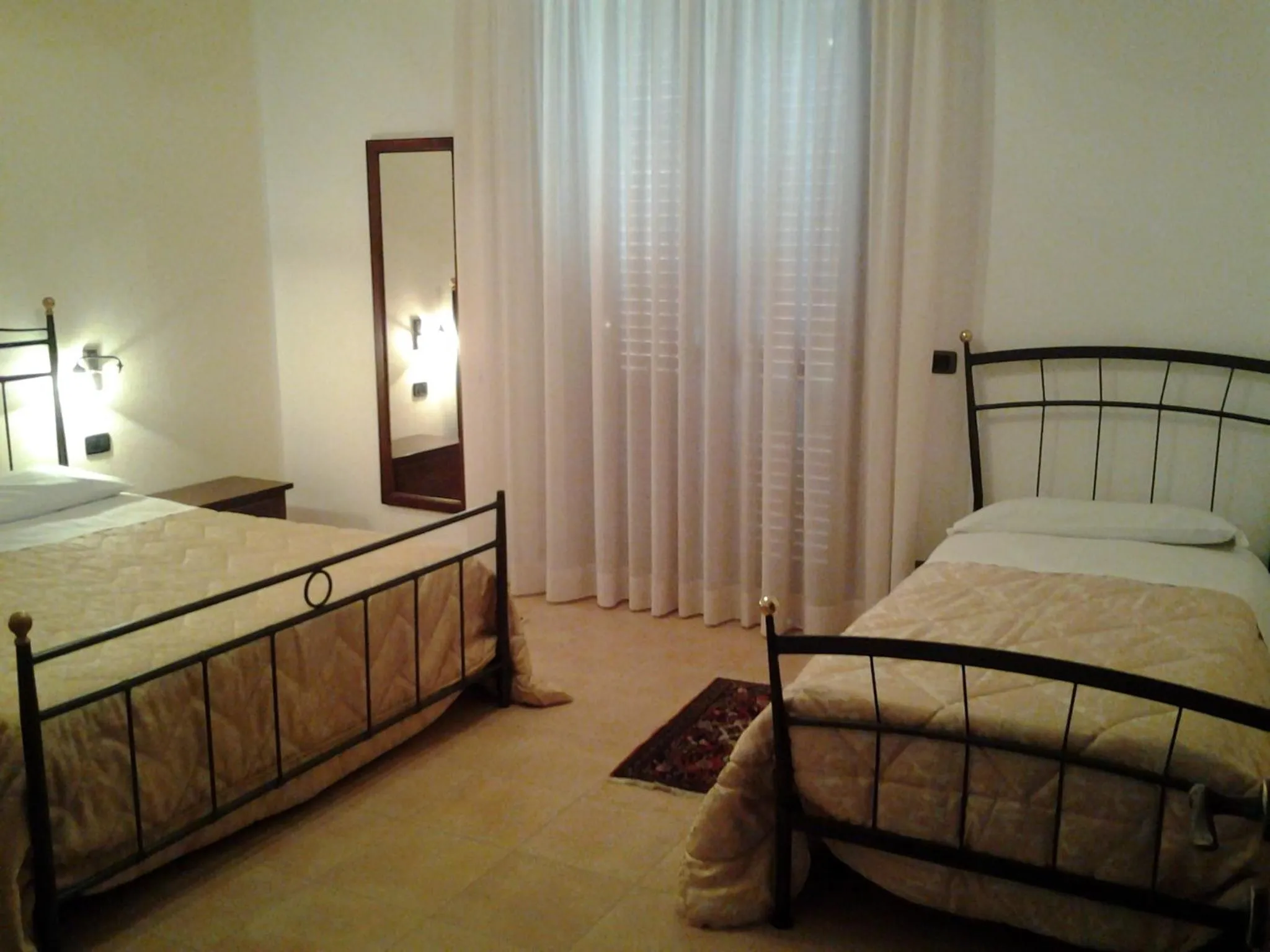 Photo of the whole room, Bed in History Hotel