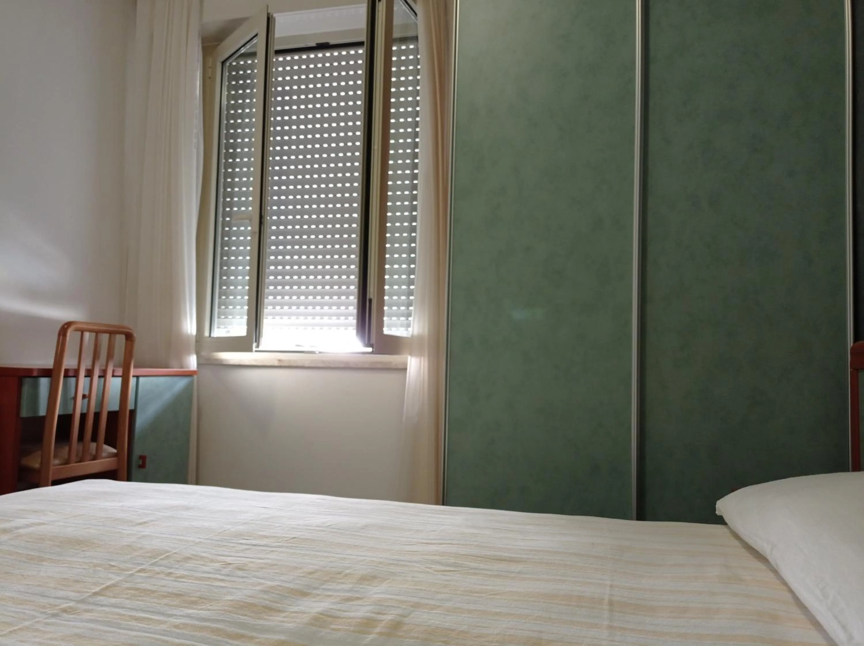 Bedroom in Hotel Costanza