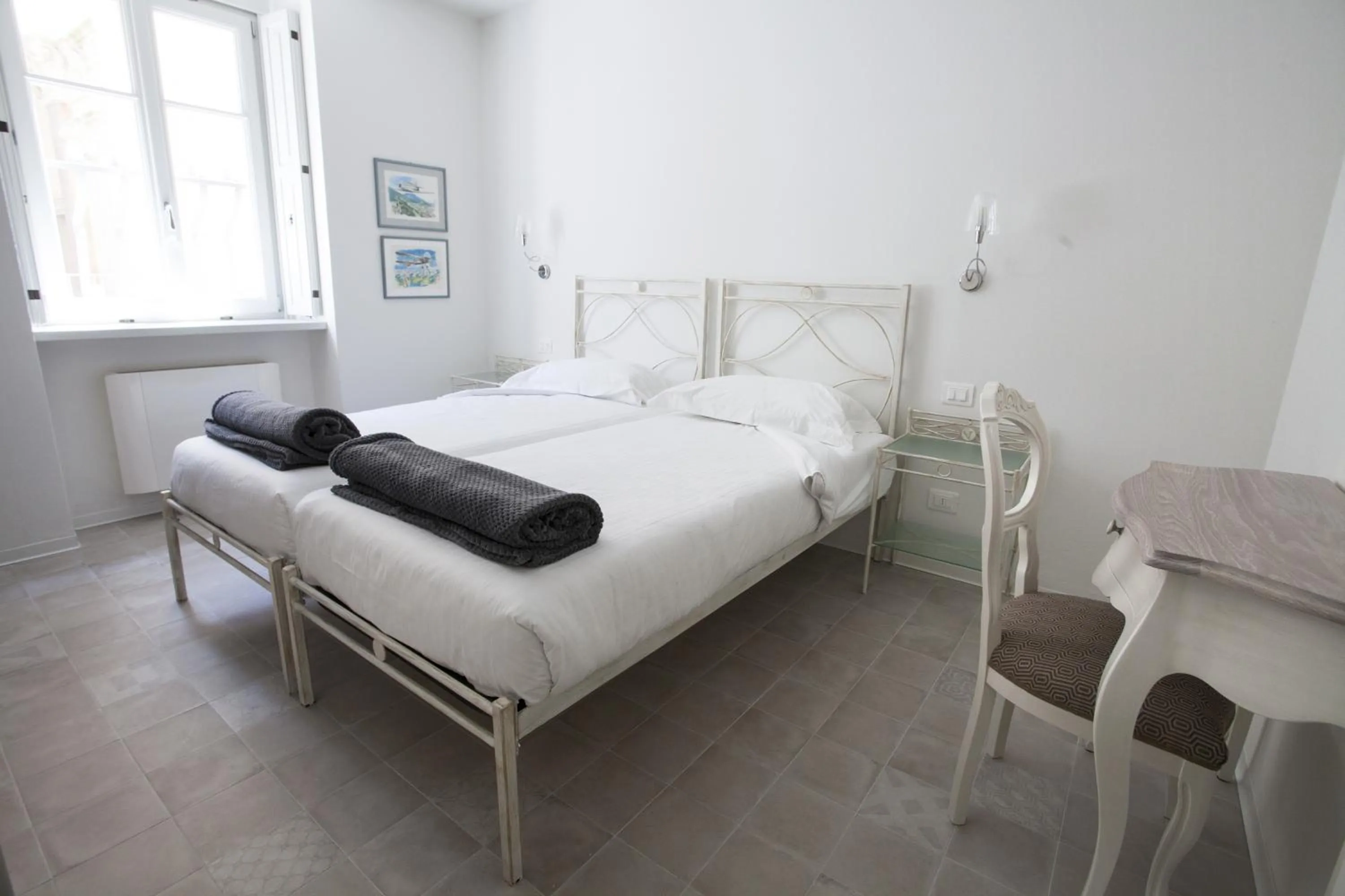 Bed in Villa Italia Luxury Suites and Apartments