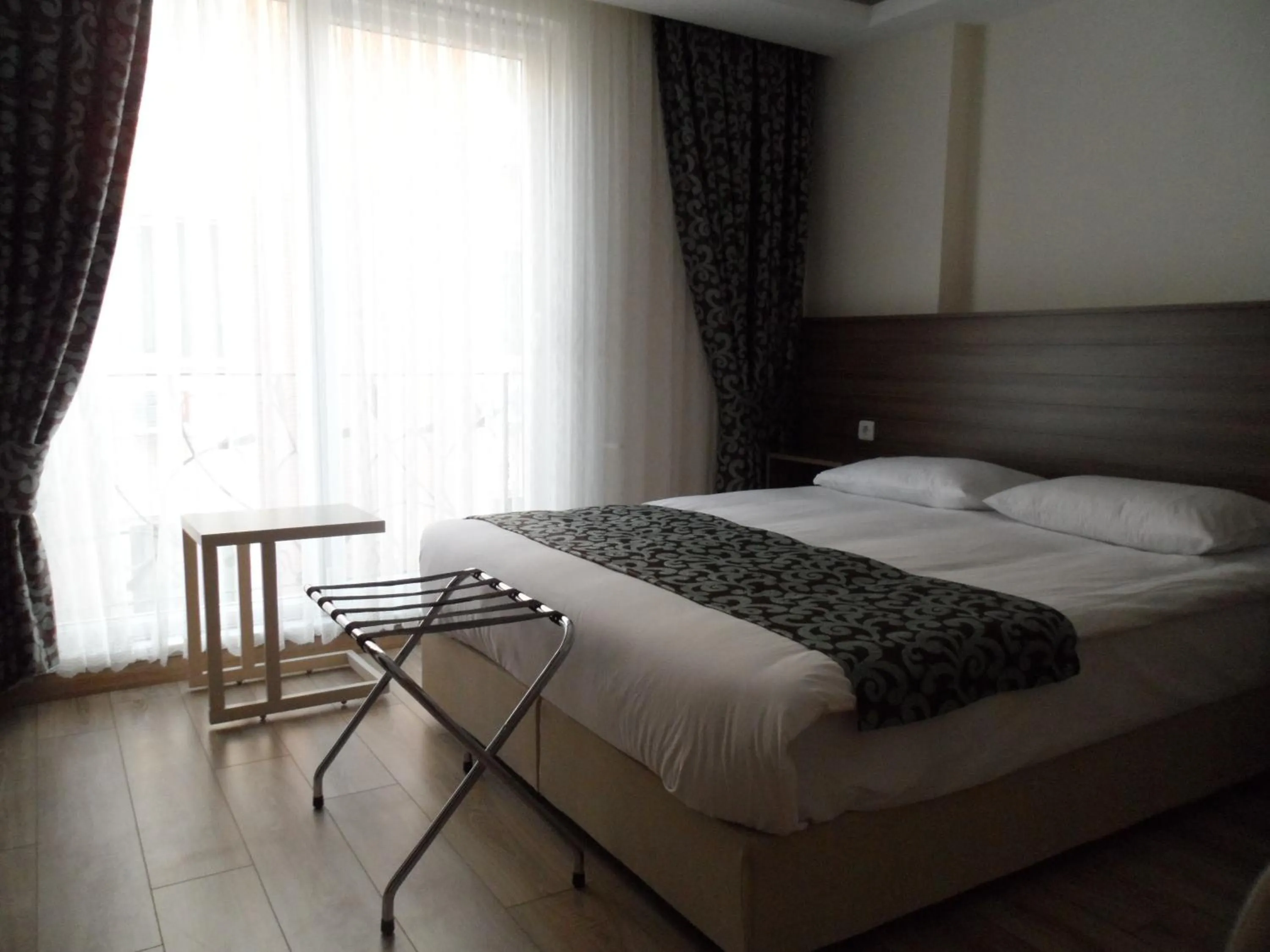 Photo of the whole room, Bed in Zen Inn Boutique