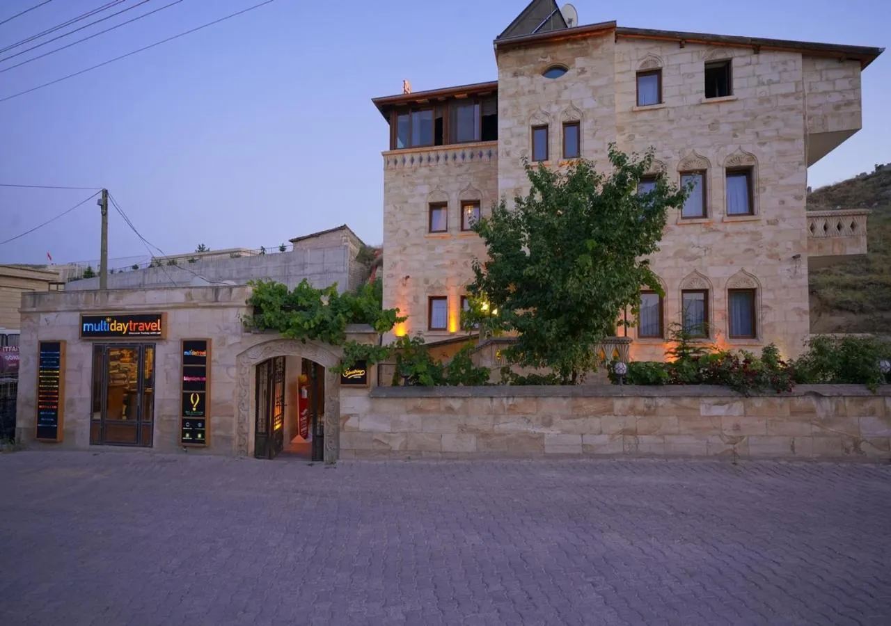 Property building in ShoeString Stone House