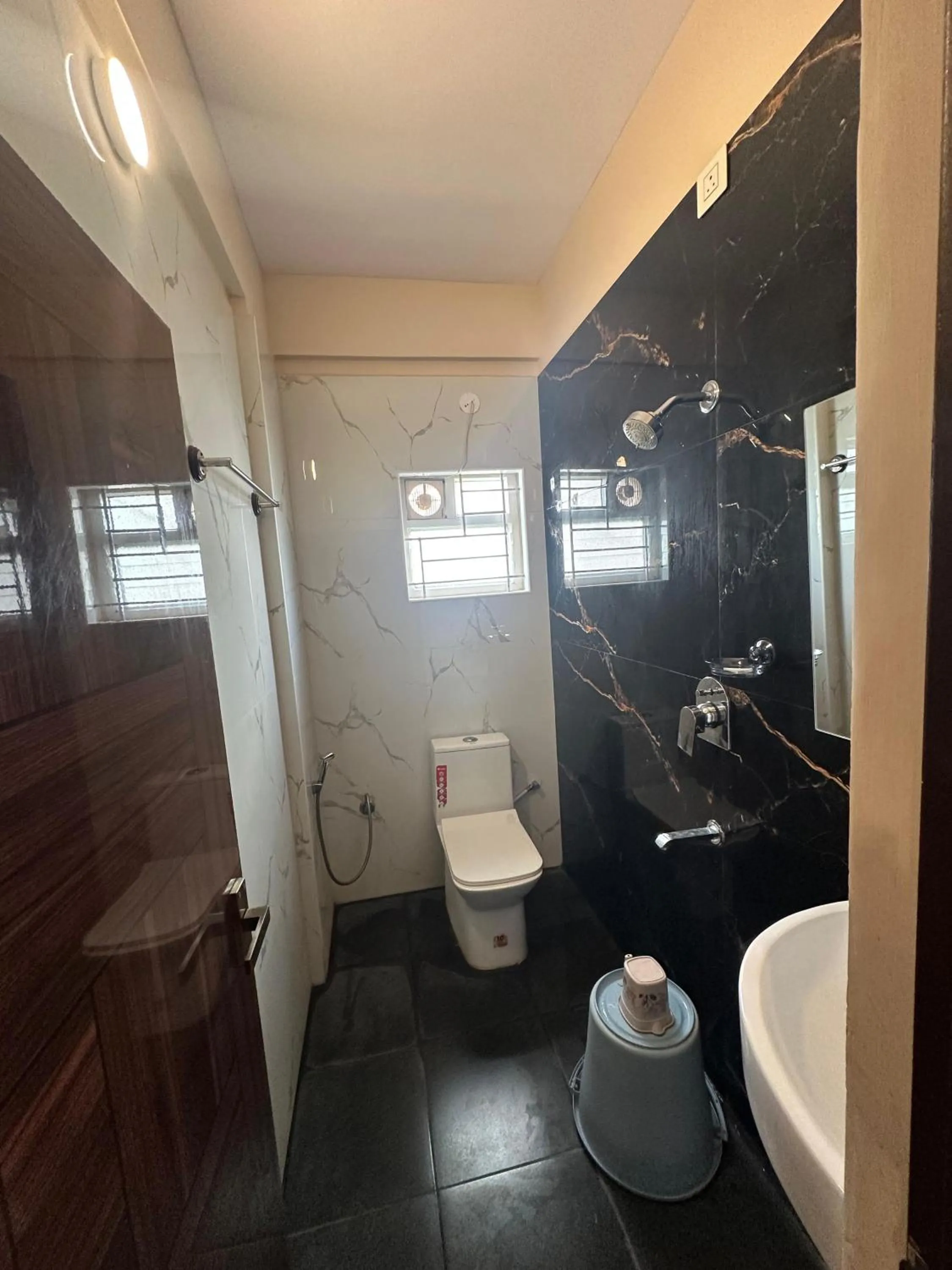 Shower in Hotel Well Suites Near Electronic City 400 Mtr