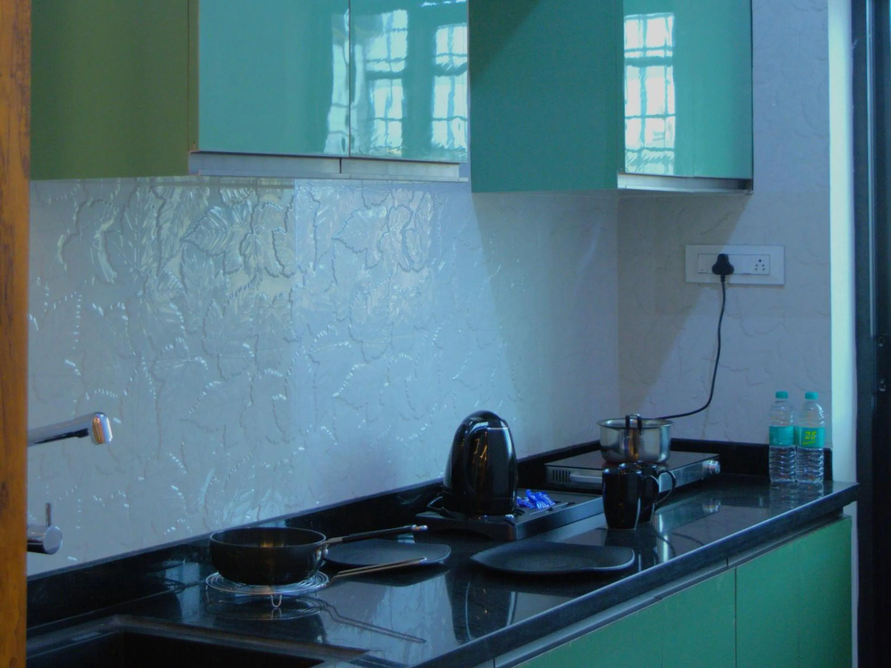 Kitchen or kitchenette in City Service Apartment