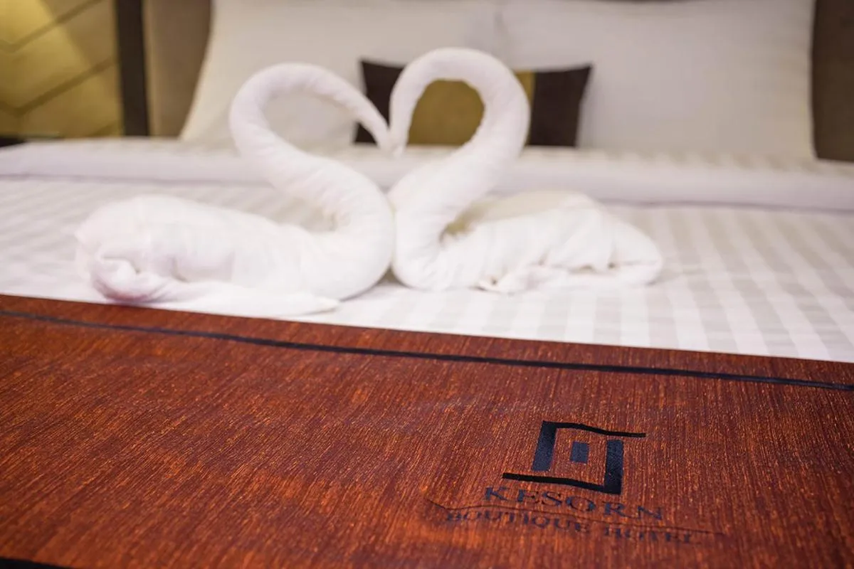 Bed in Kesorn Boutique Hotel