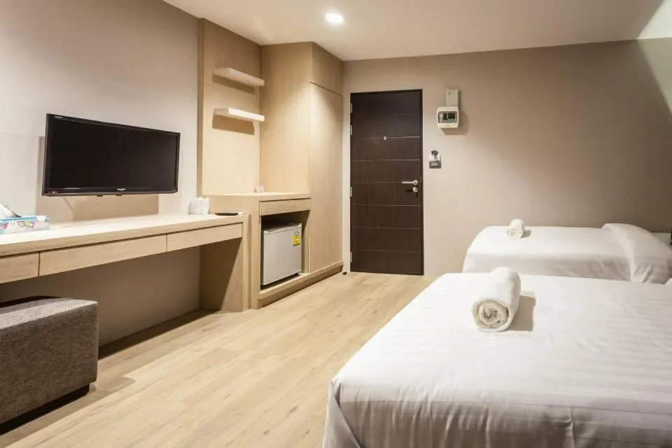 Bed in Kesorn Boutique Hotel