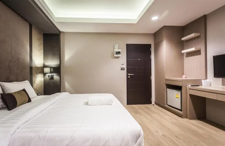 Bed in Kesorn Boutique Hotel