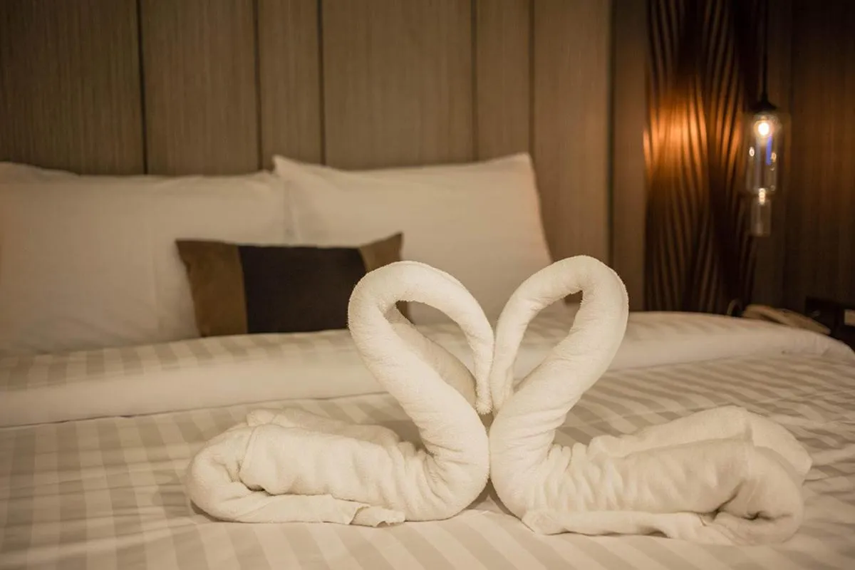 Bed in Kesorn Boutique Hotel