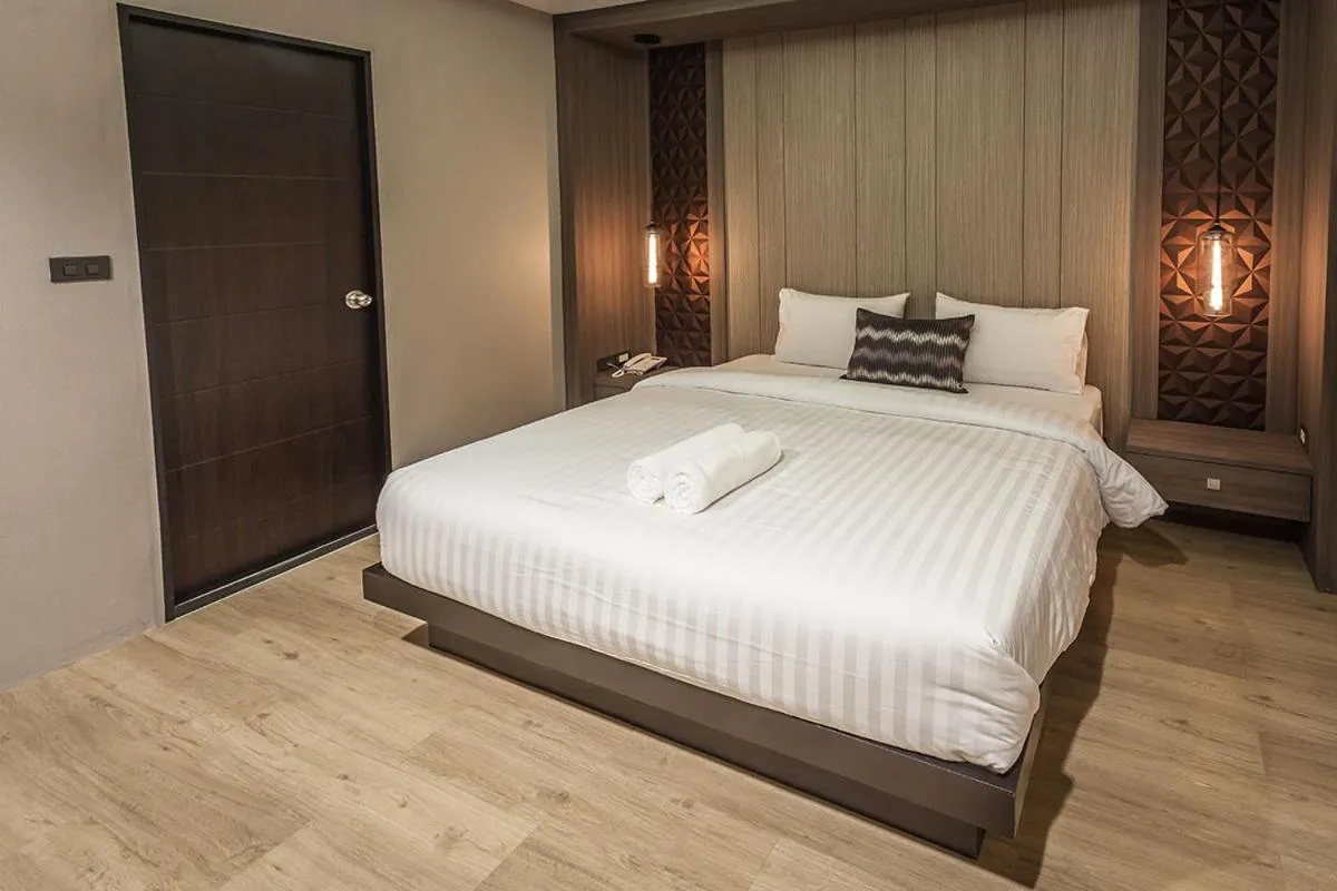 Bed in Kesorn Boutique Hotel