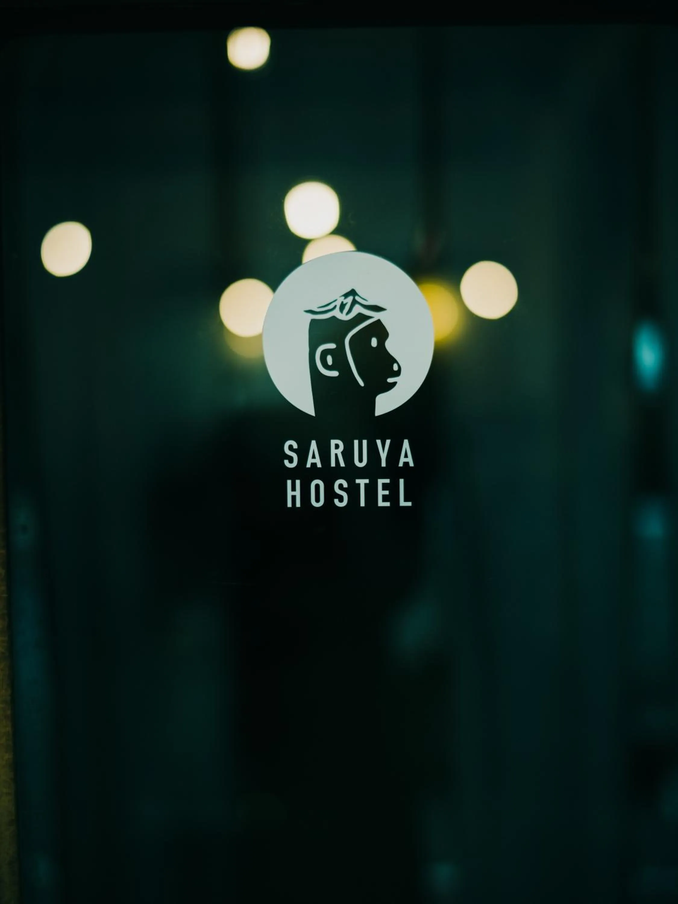 Property logo or sign in Hostel Saruya