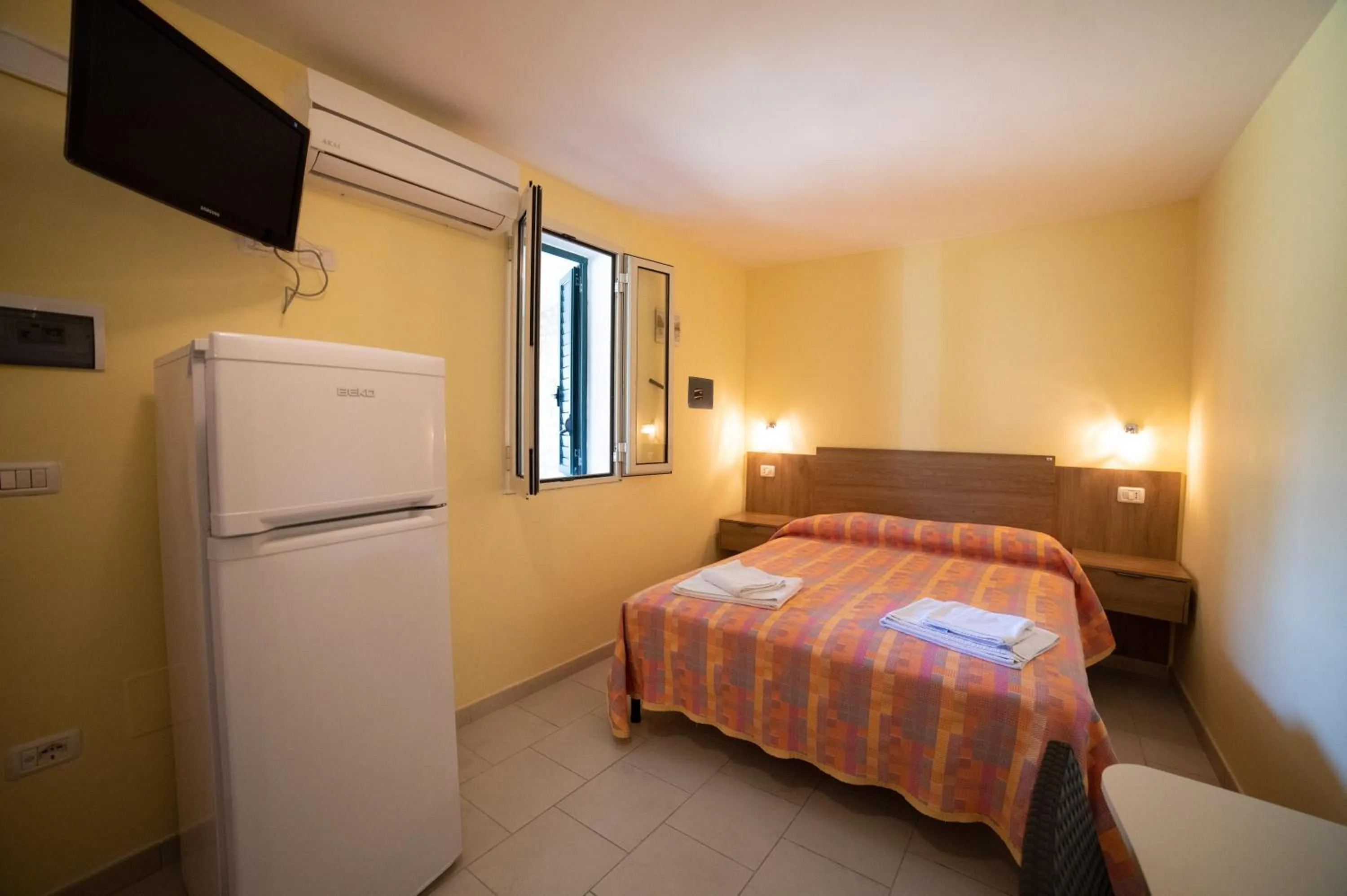 Kitchen or kitchenette, Bed in Coppola Rossa Relax