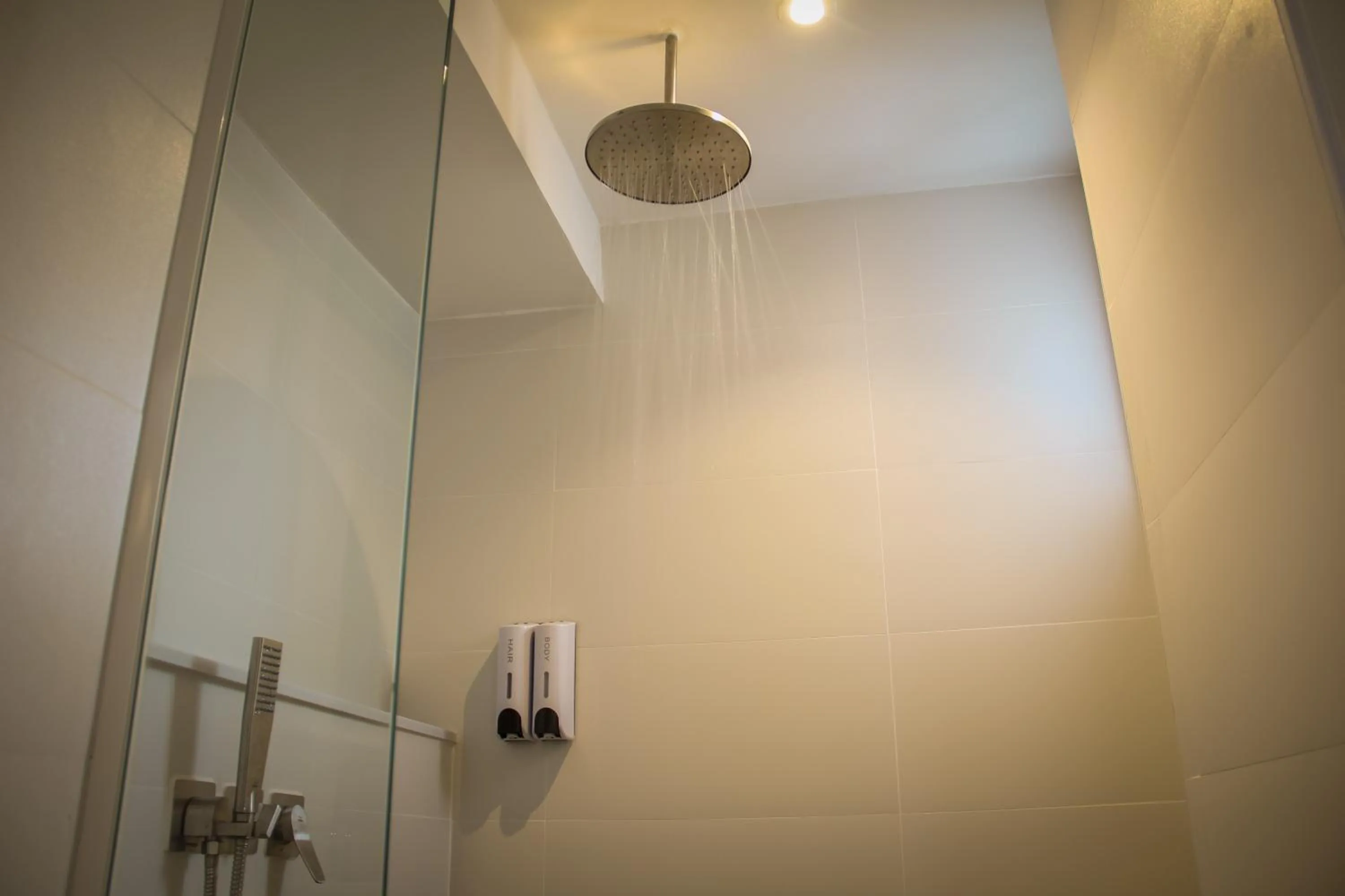 Bathroom in iThaphae Hotel