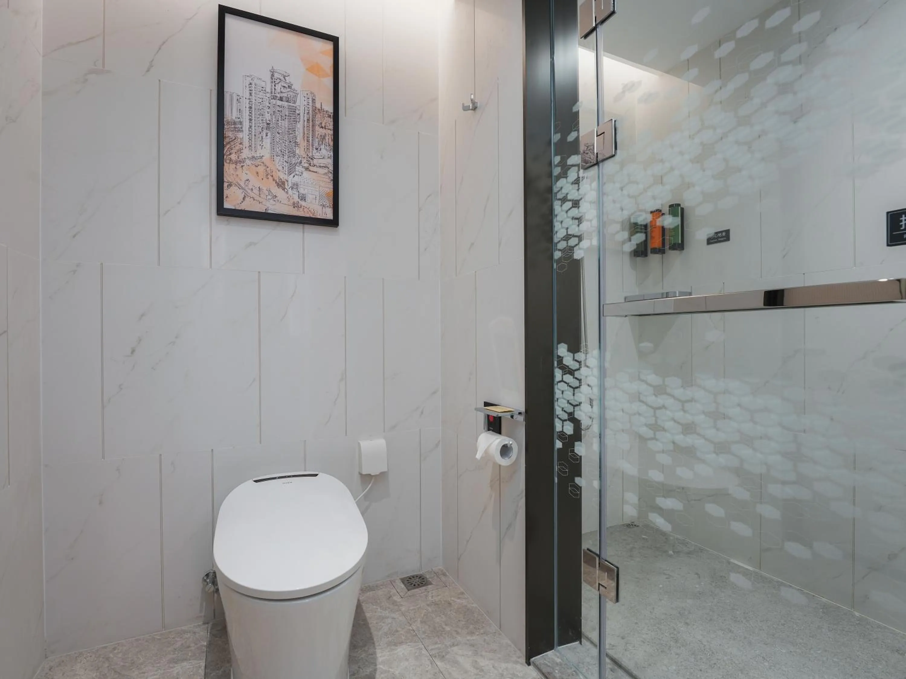 Toilet in Hampton by Hilton Dongguan Fenggang
