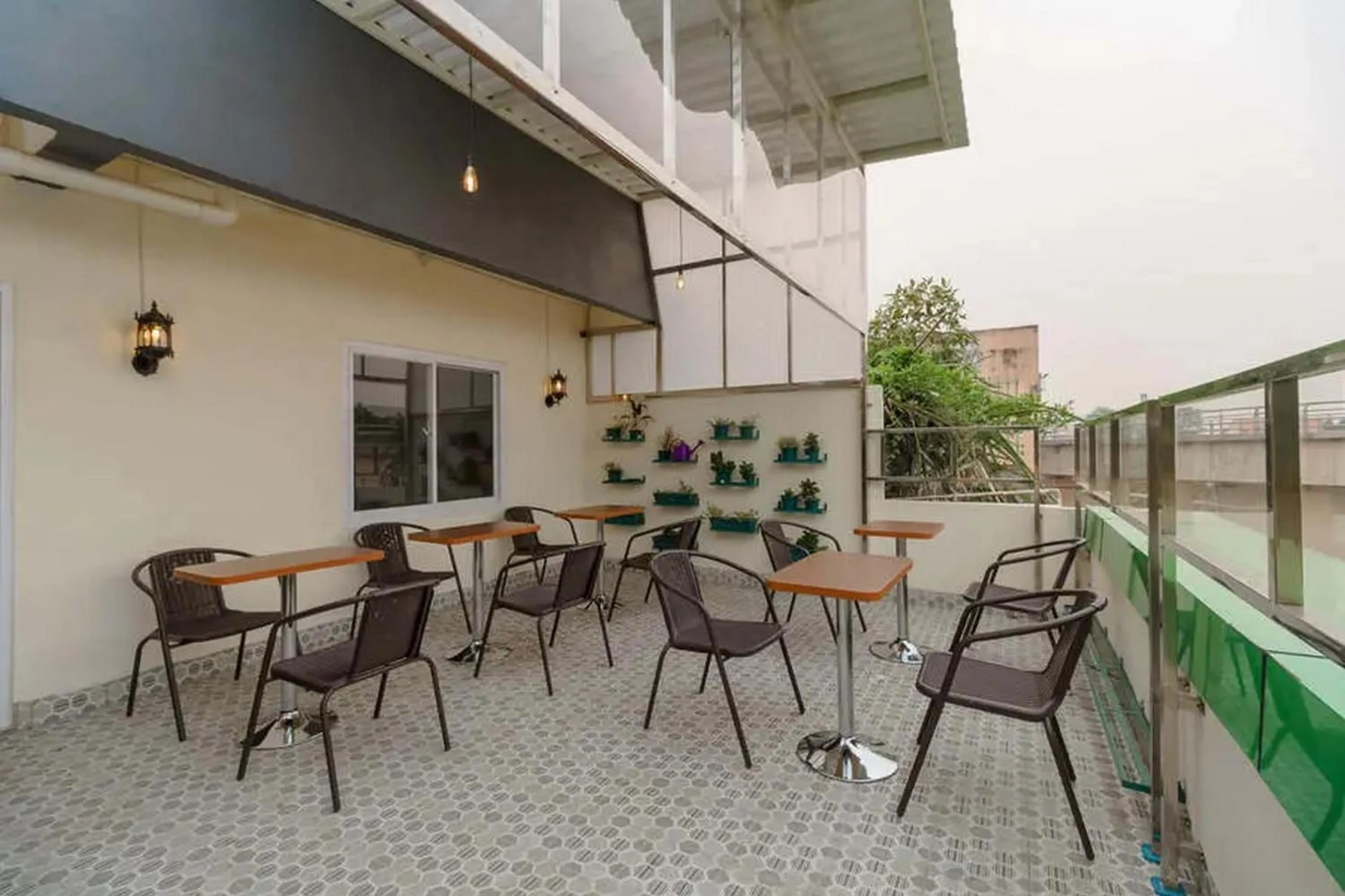 Seating area in RedDoorz Plus near RS RK Charitas 2 Palembang