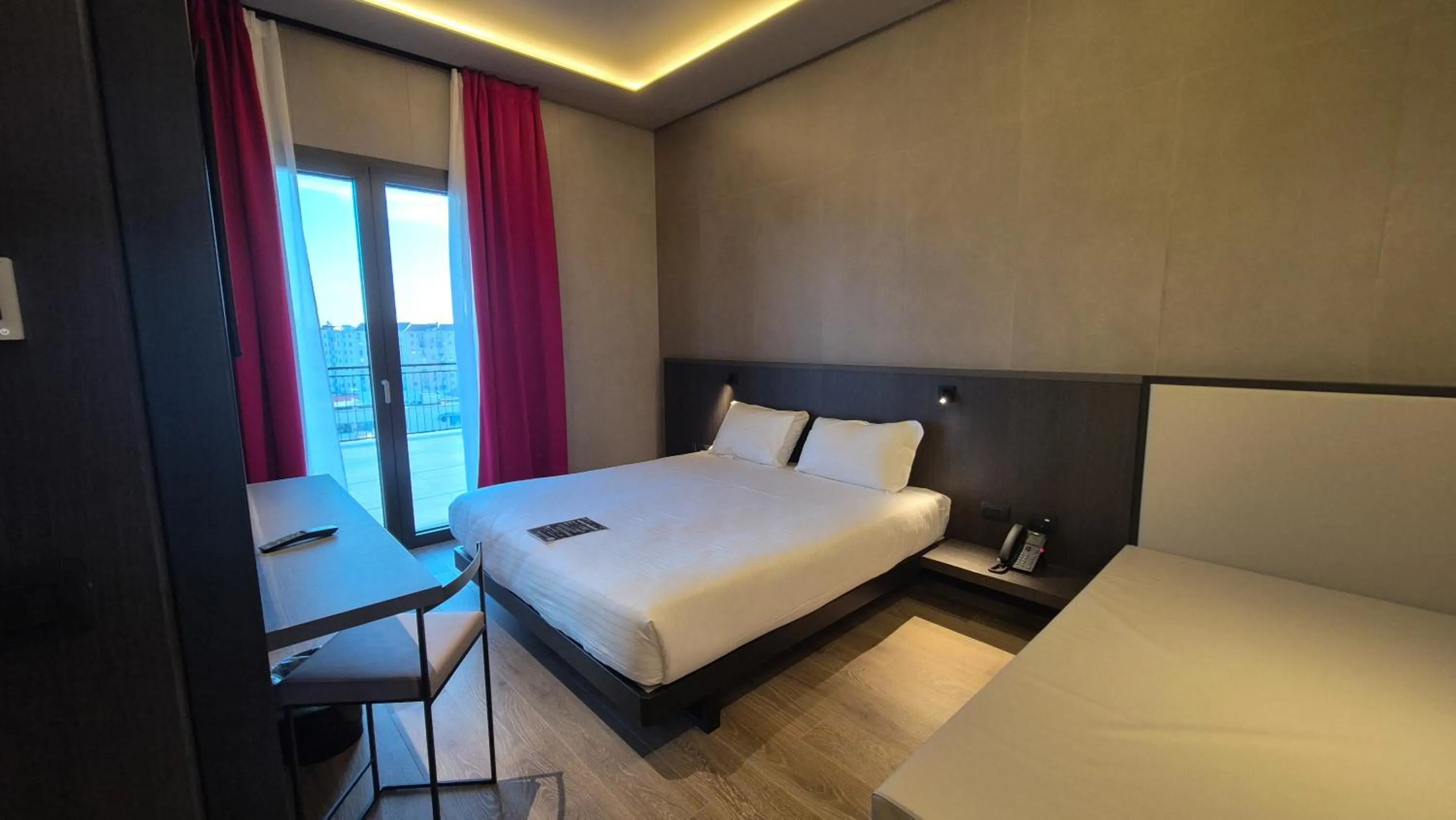 Bedroom, Bed in Kira Suites Hotel Milano