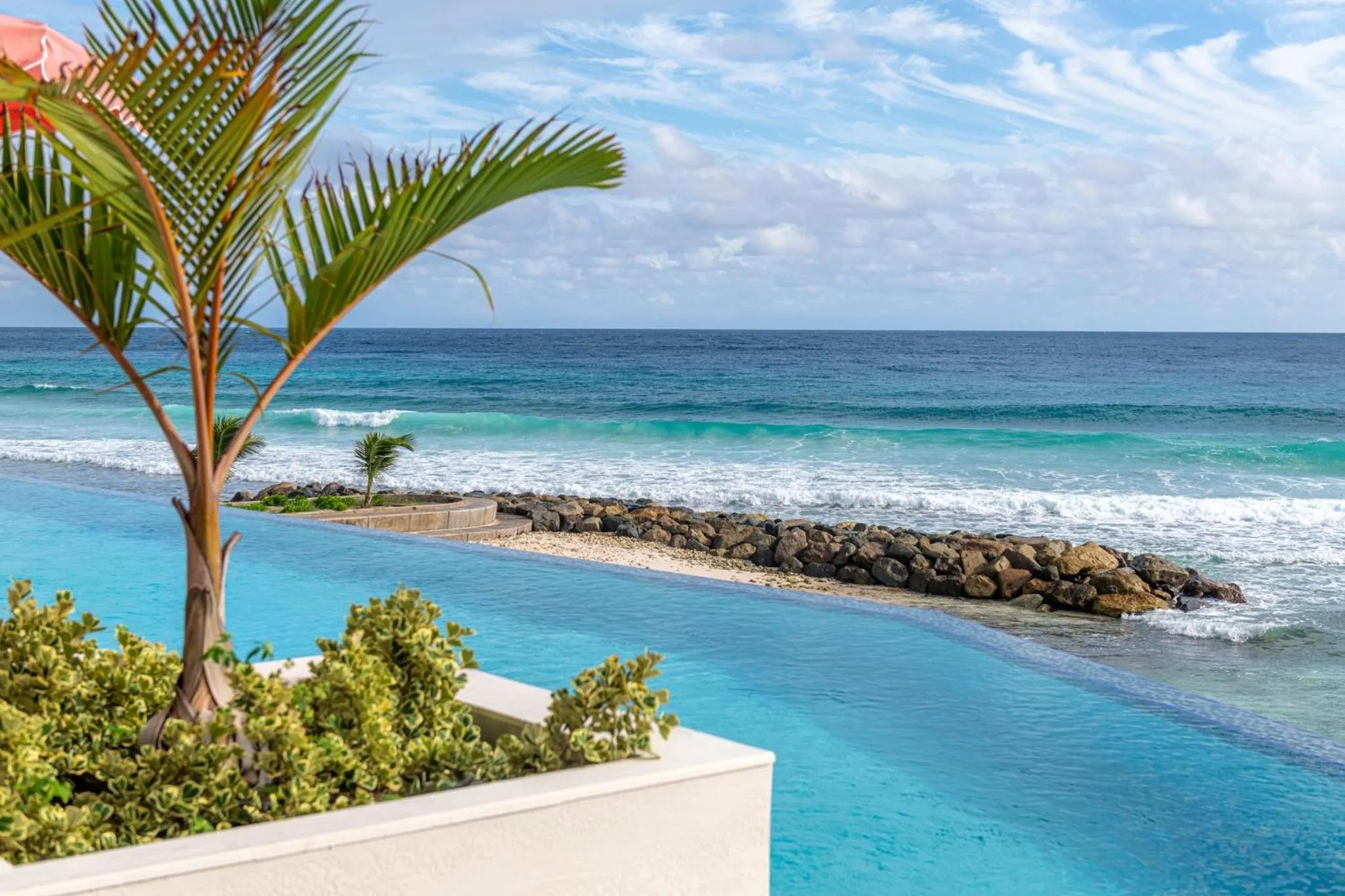 Swimming pool in Hotel Indigo Bridgetown Barbados by IHG
