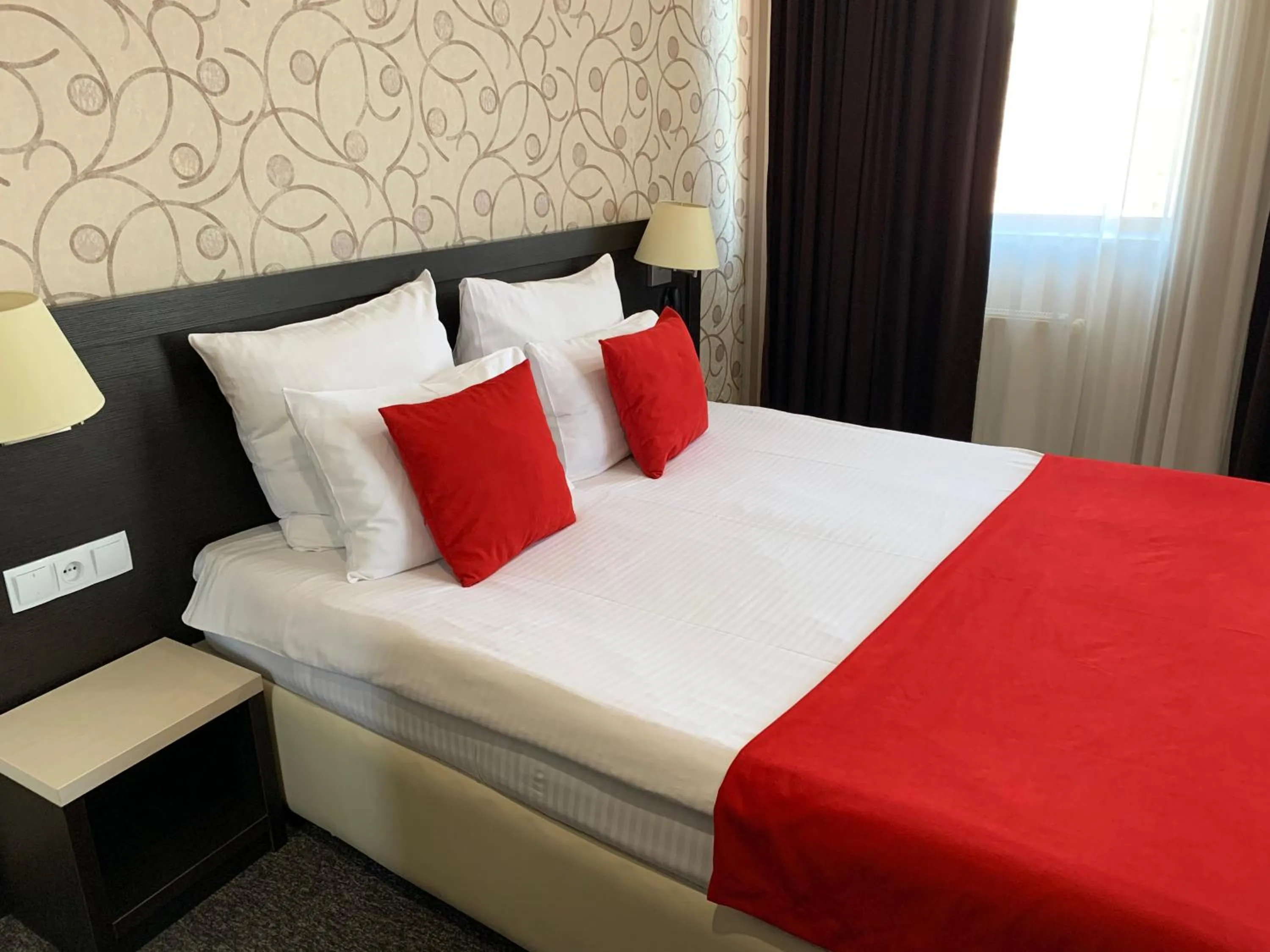 Bed in East Gate Boutique Hotel