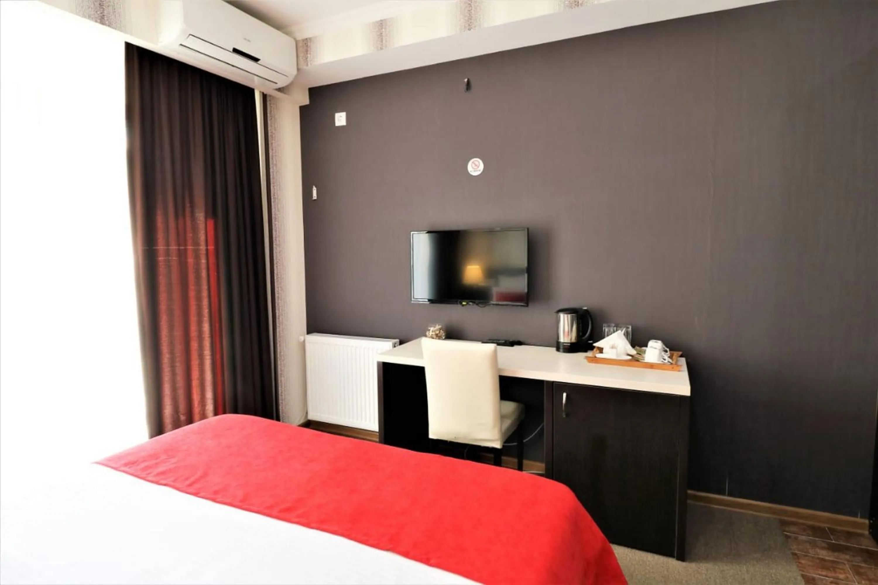 Photo of the whole room, Bed in East Gate Boutique Hotel