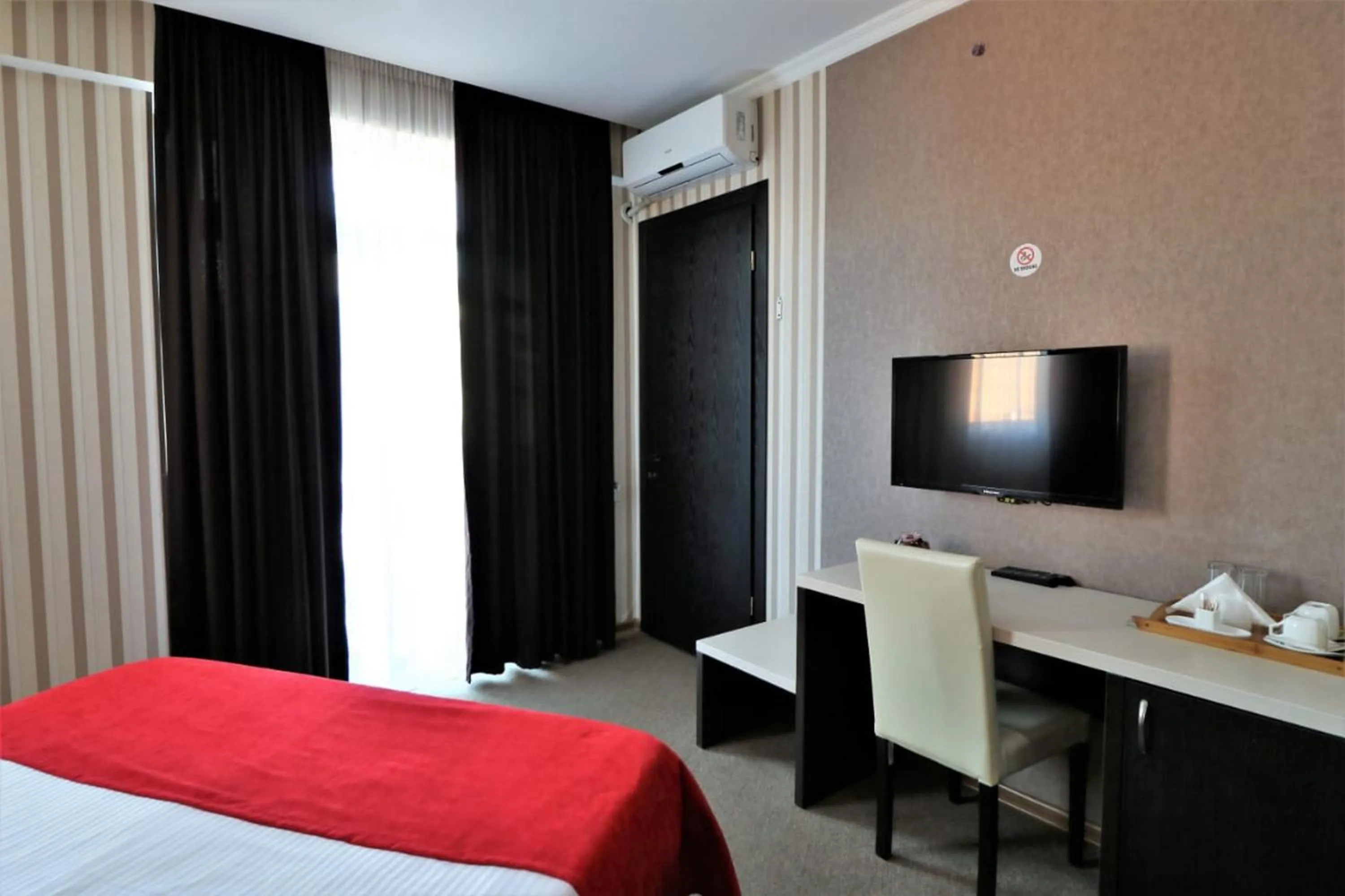 TV and multimedia, Bed in East Gate Boutique Hotel