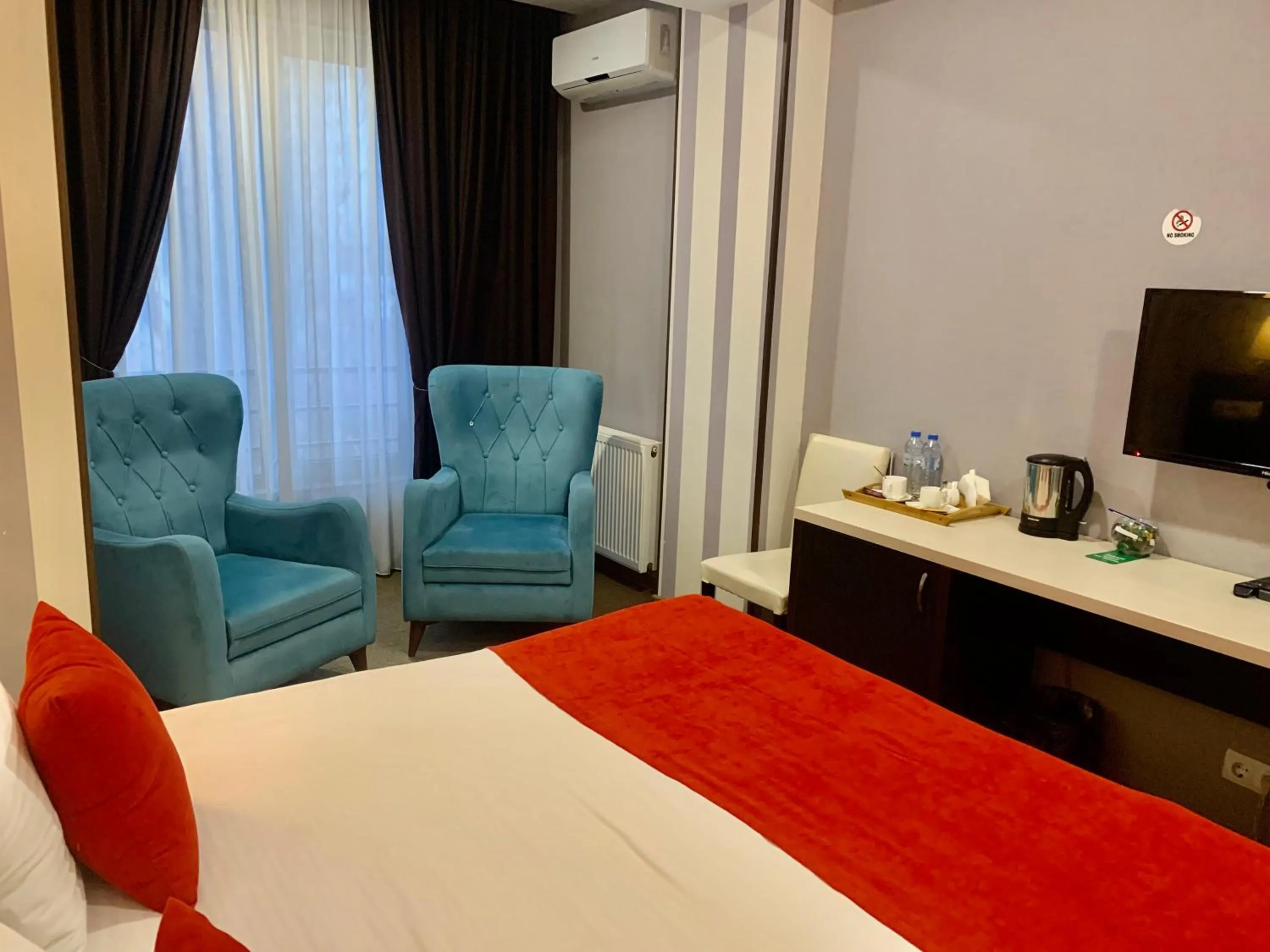 Bed in East Gate Boutique Hotel