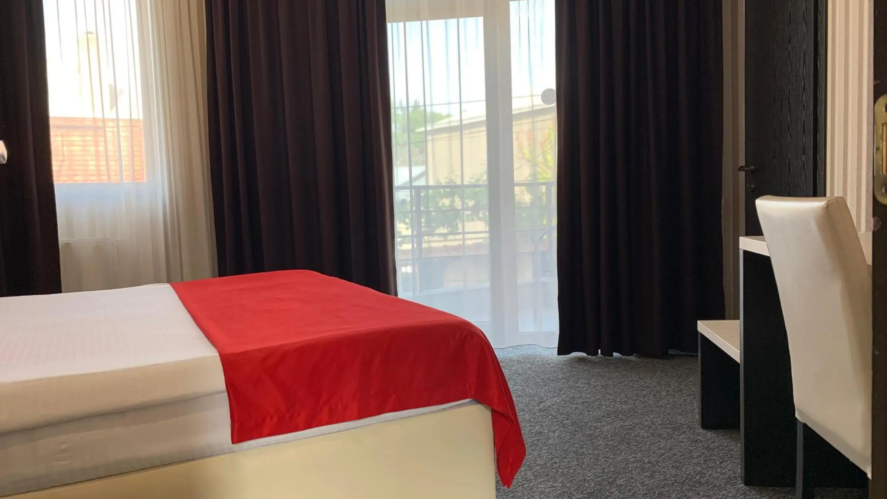 Photo of the whole room, Bed in East Gate Boutique Hotel