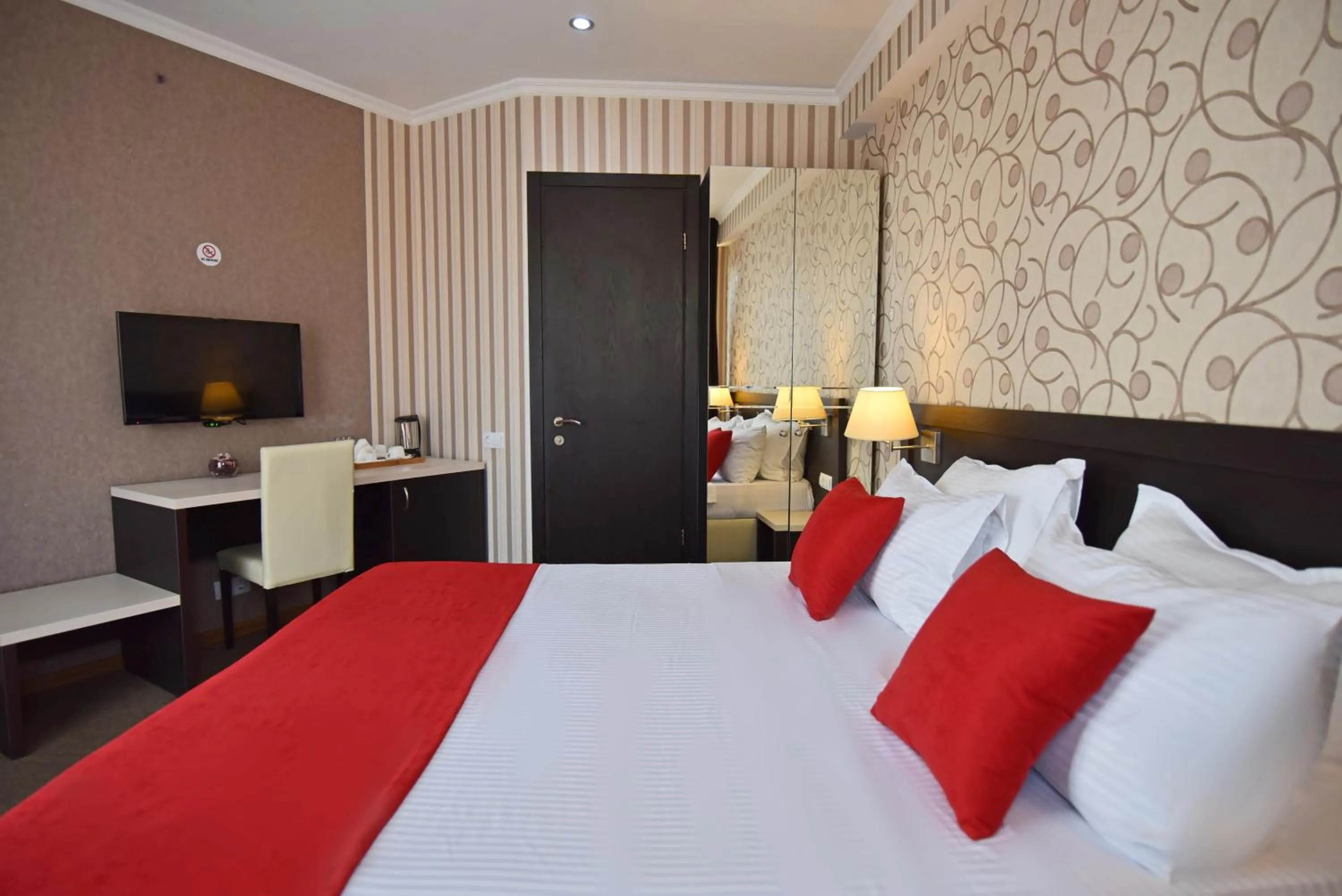 Bed in East Gate Boutique Hotel