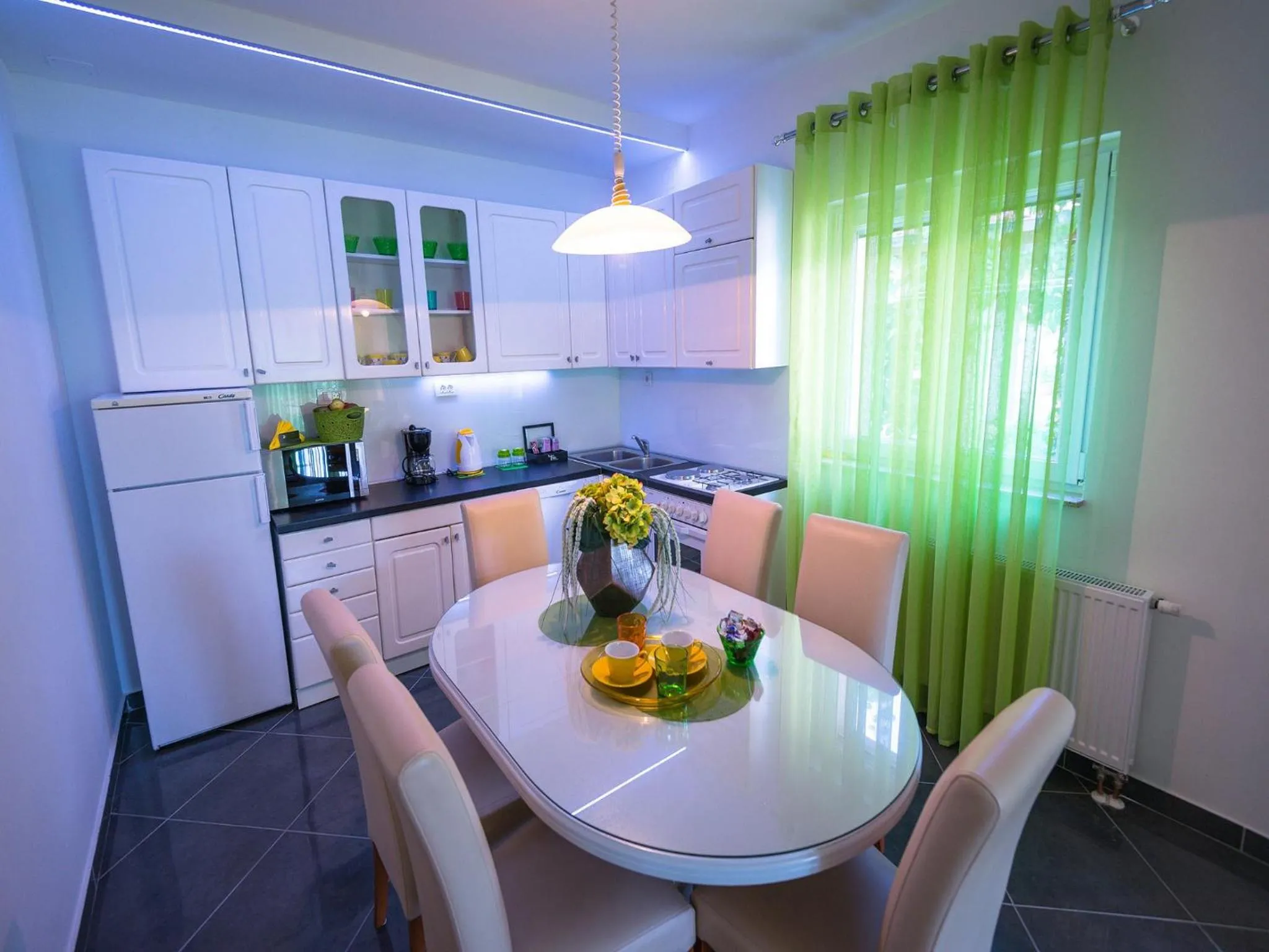 Kitchen or kitchenette in Apartments Sunny Garden