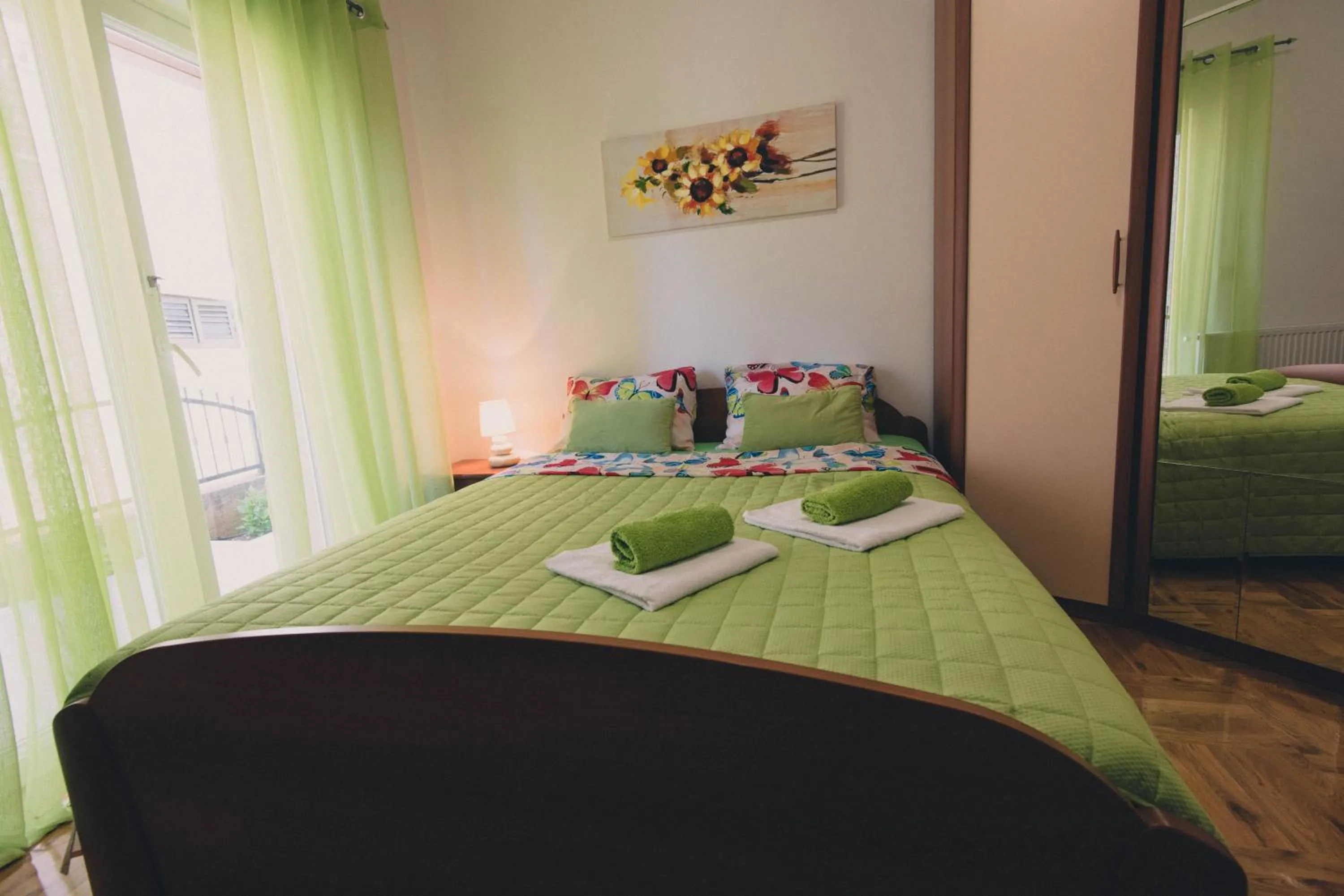 Bedroom, Bed in Apartments Sunny Garden