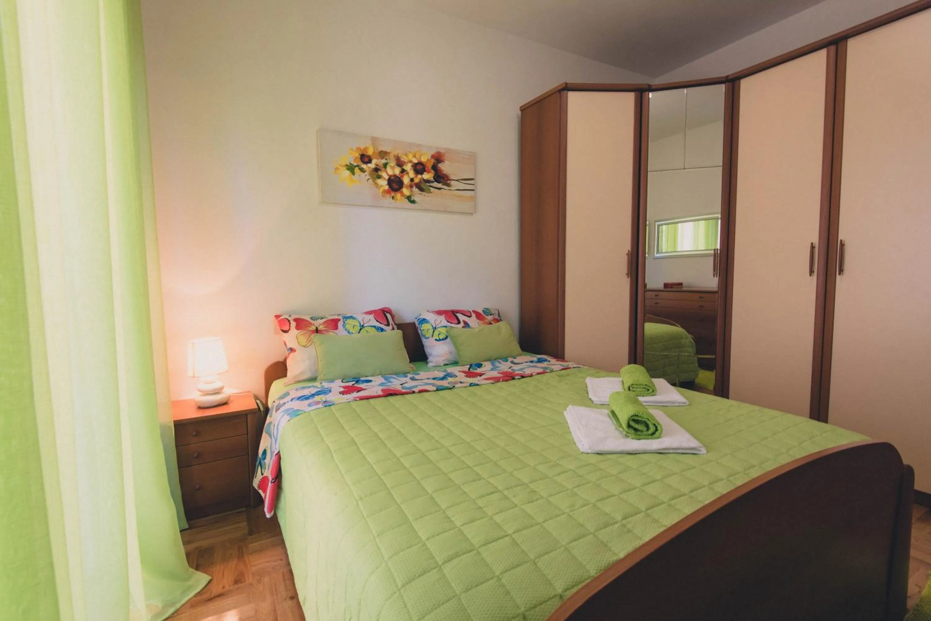 Bedroom, Bed in Apartments Sunny Garden