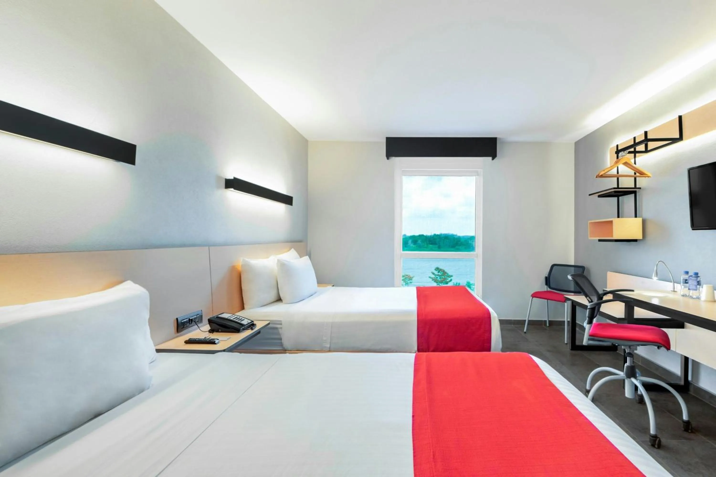 Photo of the whole room, Bed in City Express by Marriott Tuxpan