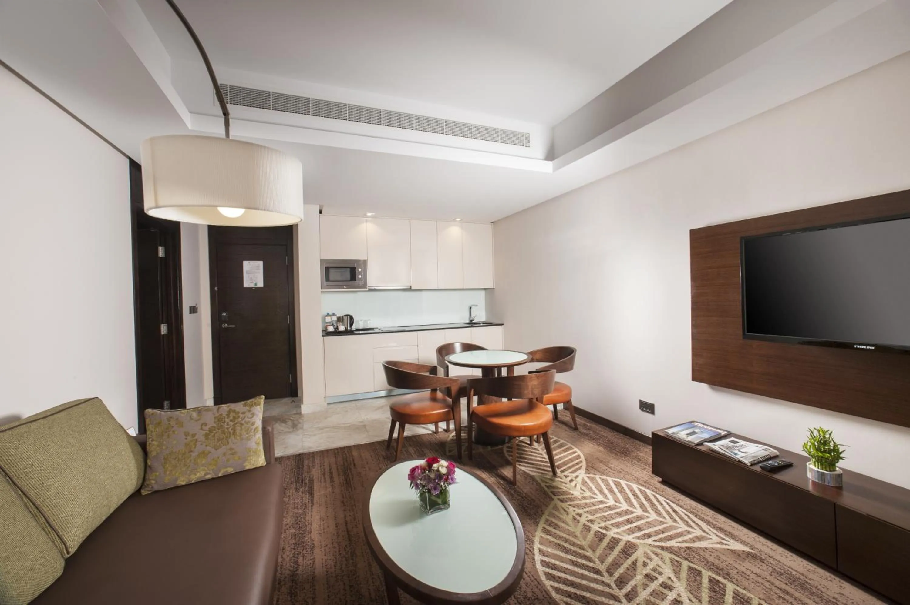 Kitchen or kitchenette in Ramee Rose Hotel