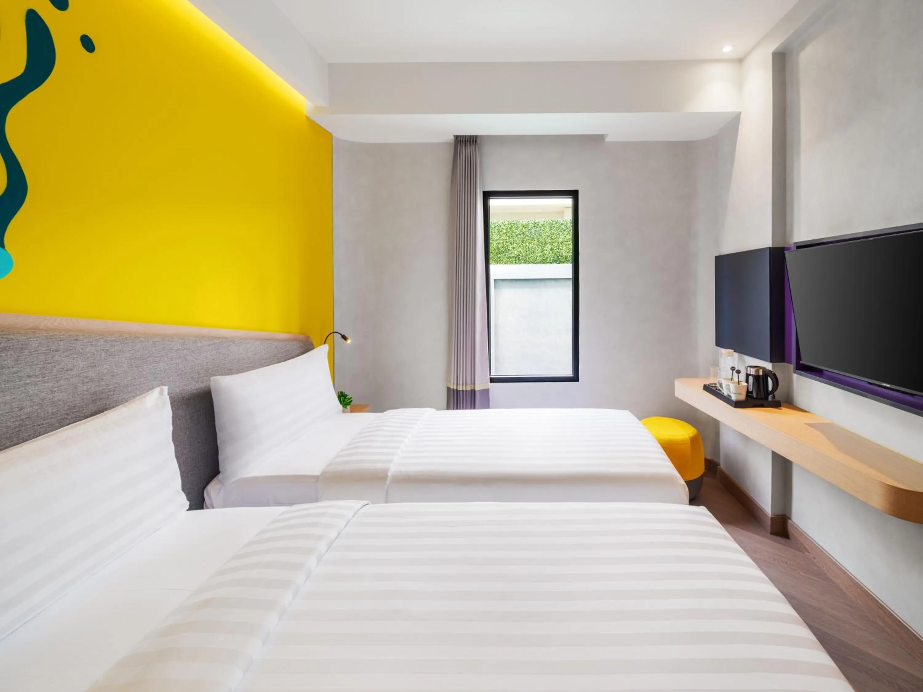 Bed in Quest Vibe Dewi Sri Bali