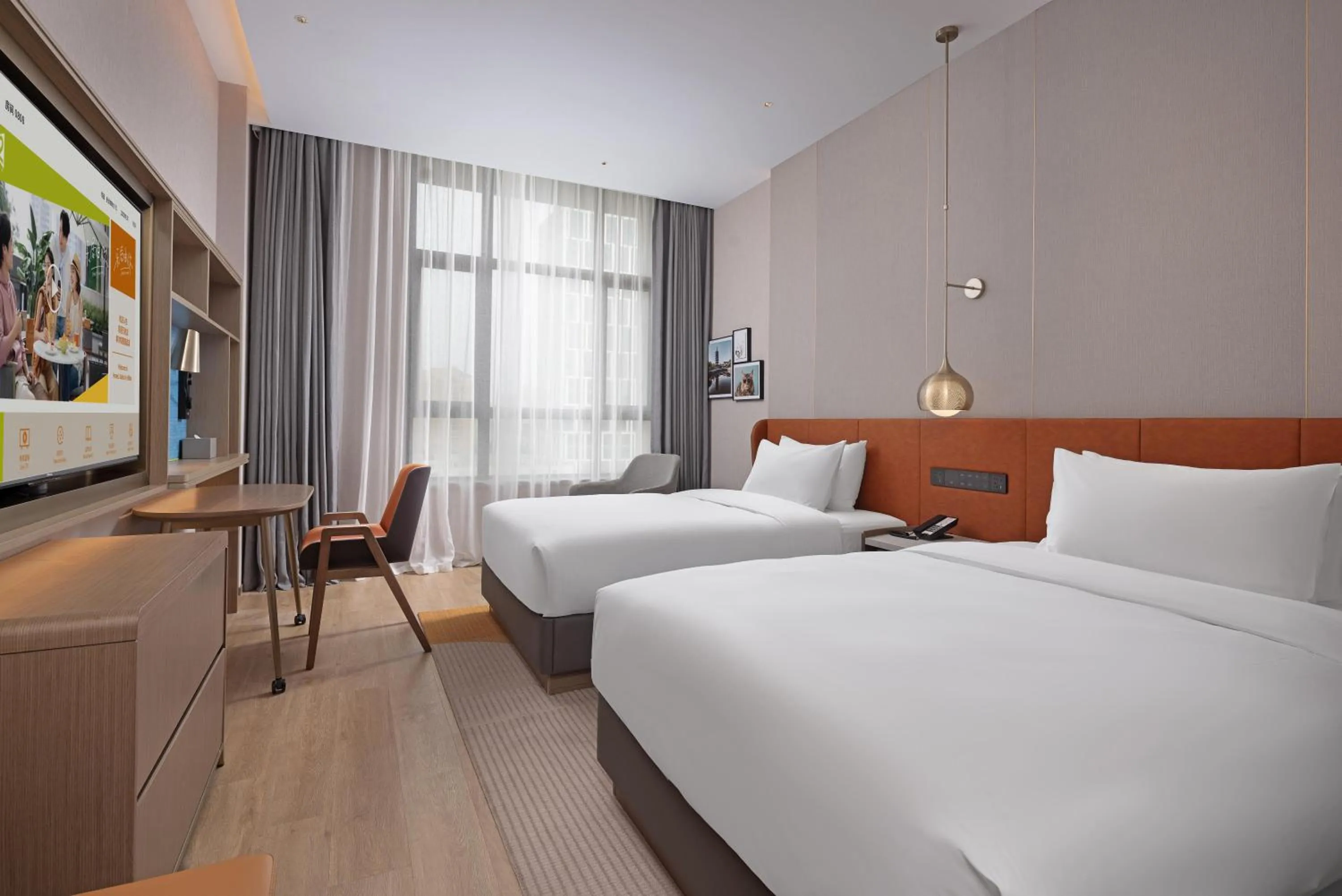 Bed in Home2 Suite by Hilton Nantong Vientiane City