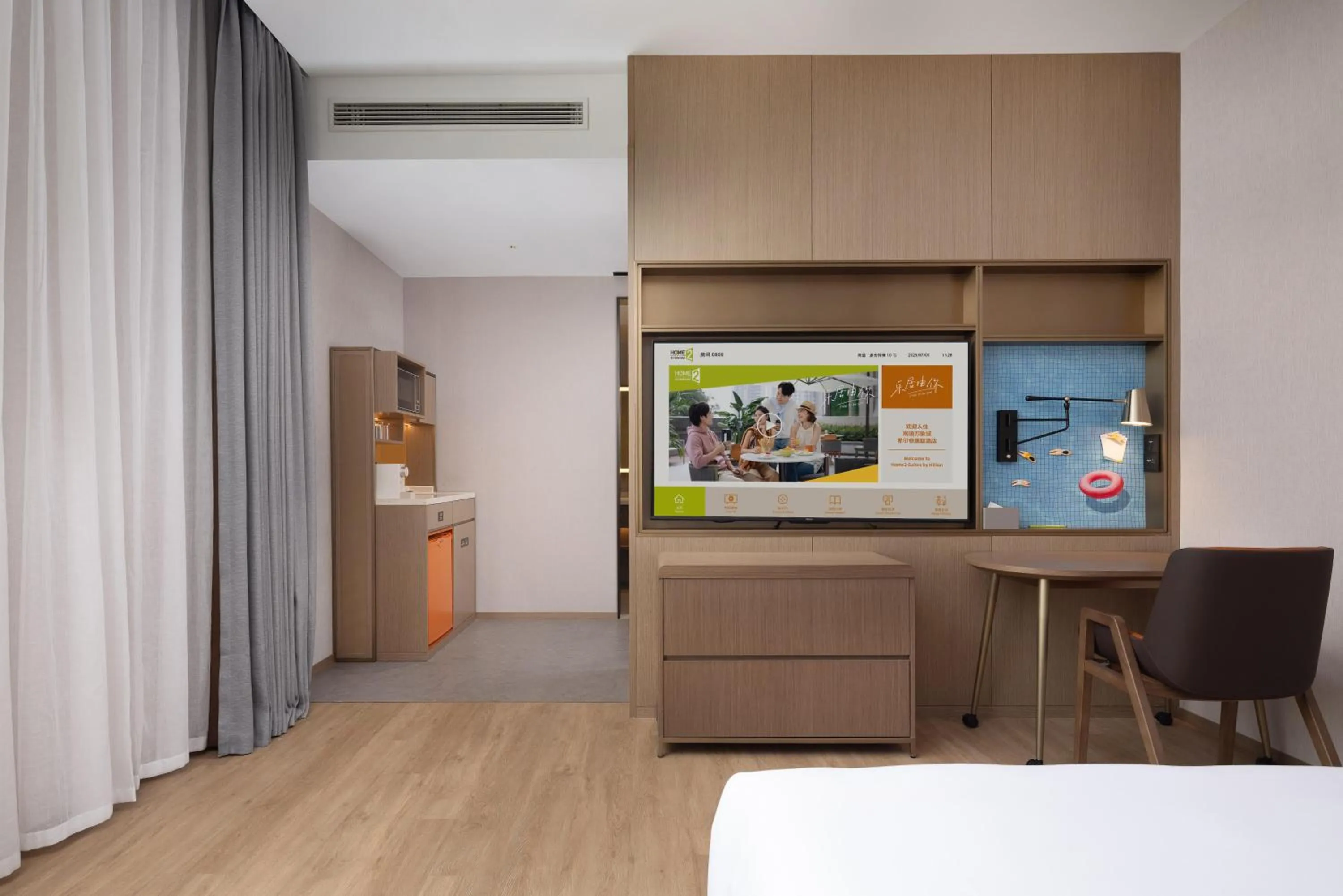 Bed in Home2 Suite by Hilton Nantong Vientiane City