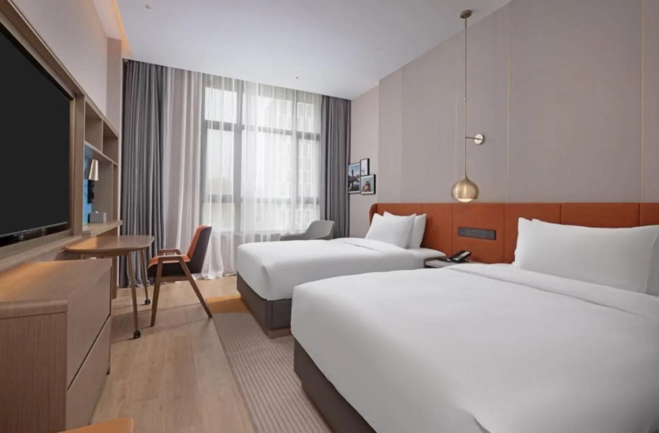 Bed in Home2 Suite by Hilton Nantong Vientiane City